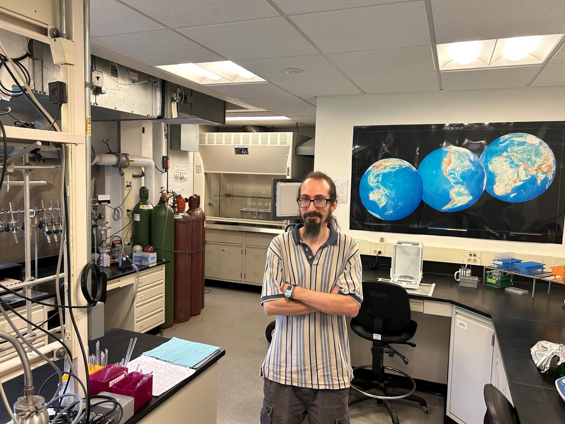 Tom Harper stands in lab 