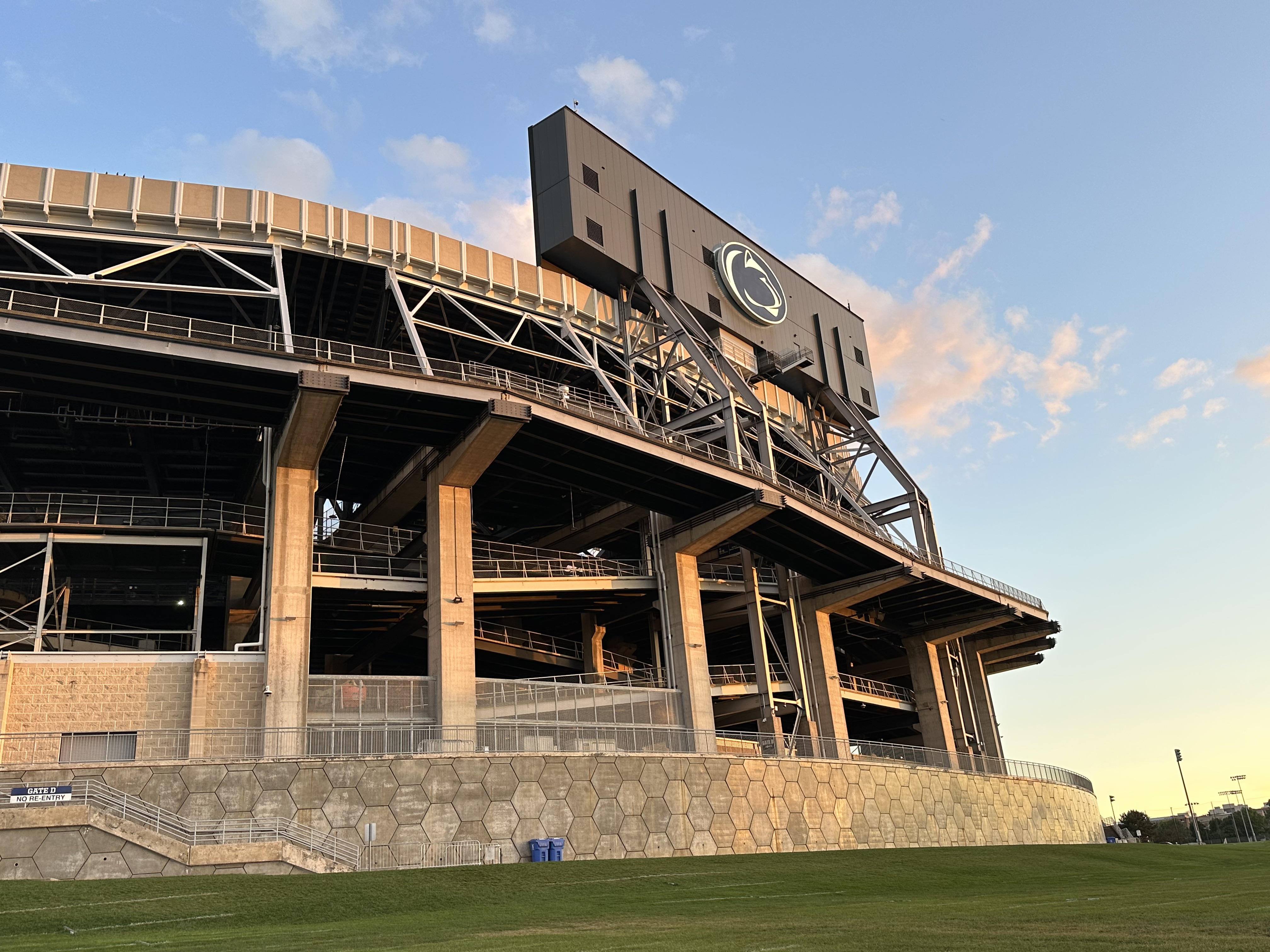 Light from the sunset hits the north side of Beaver Stadium