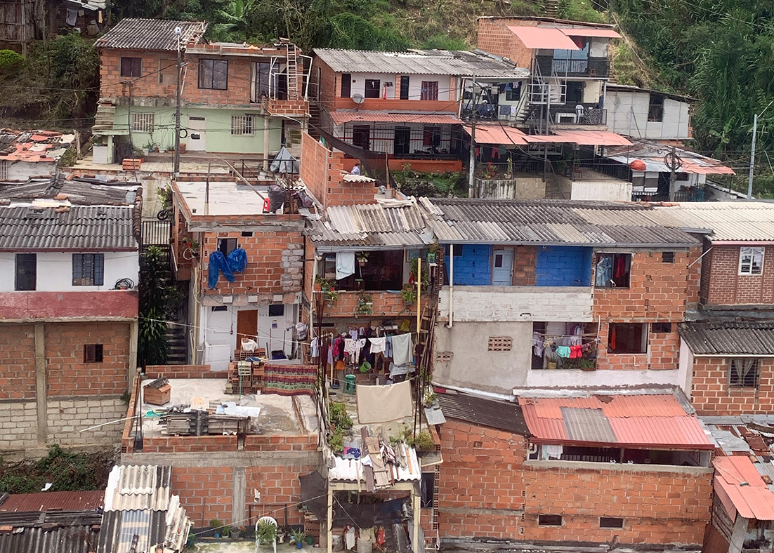 A cluster of houses nearly on top of one another in Medellín, Colombia.