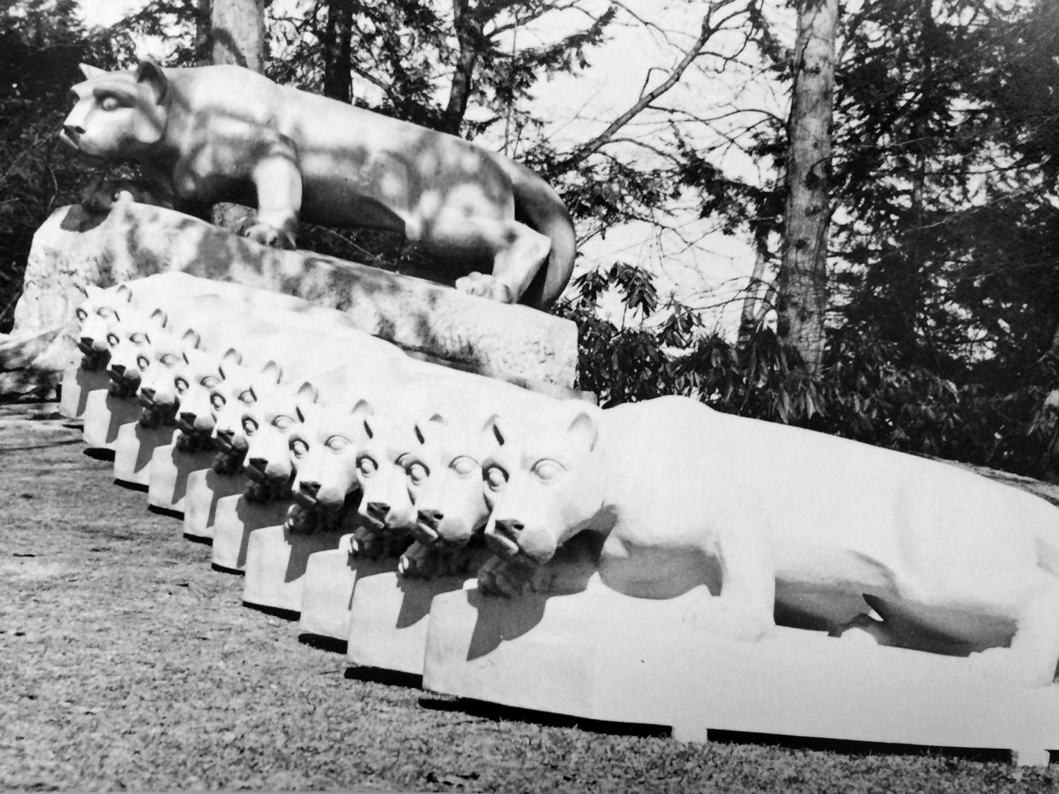 The Nittany Lion shrine with 10 smaller replicas, circa 1969