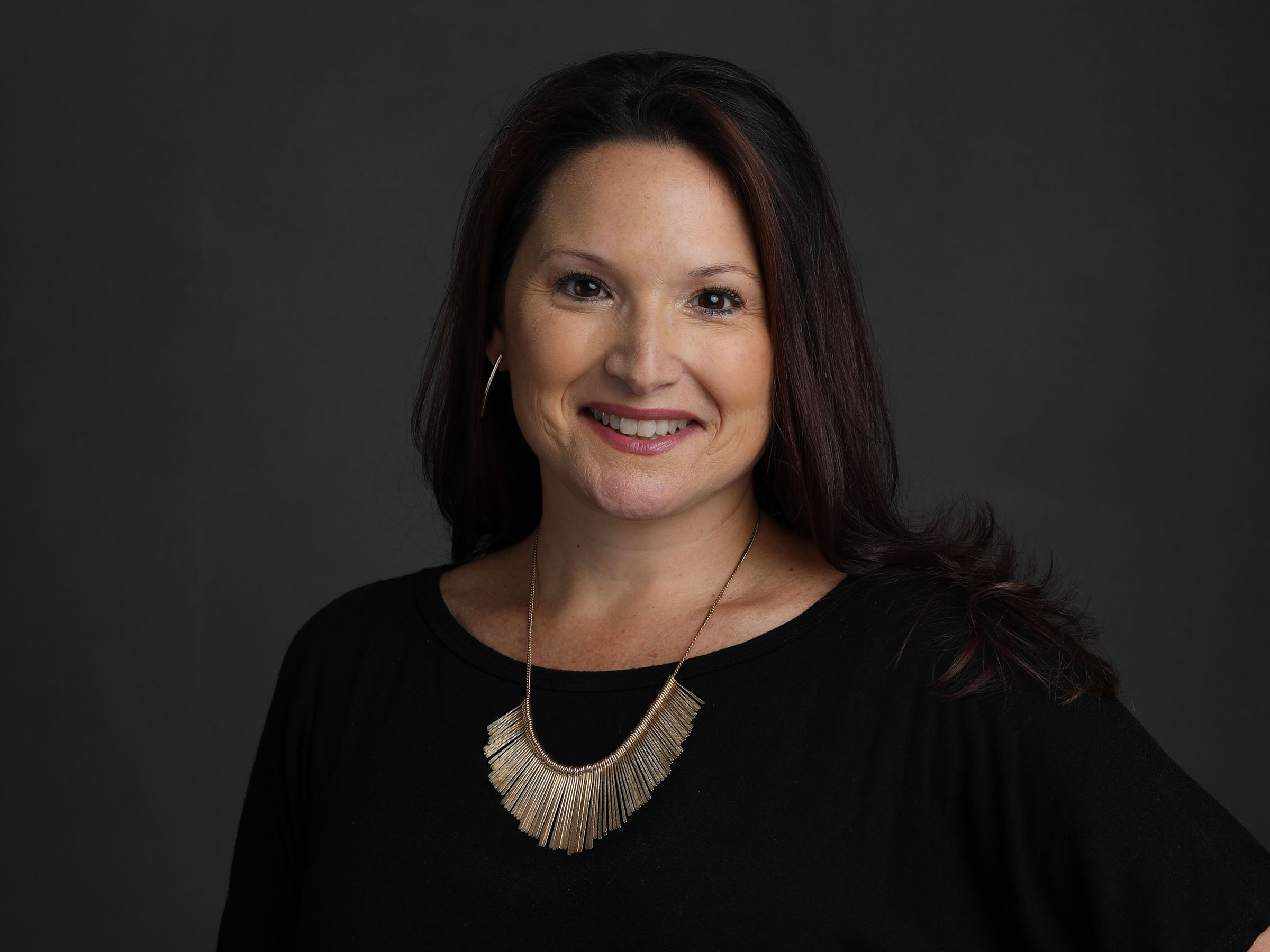 Smiling dark-haired woman 