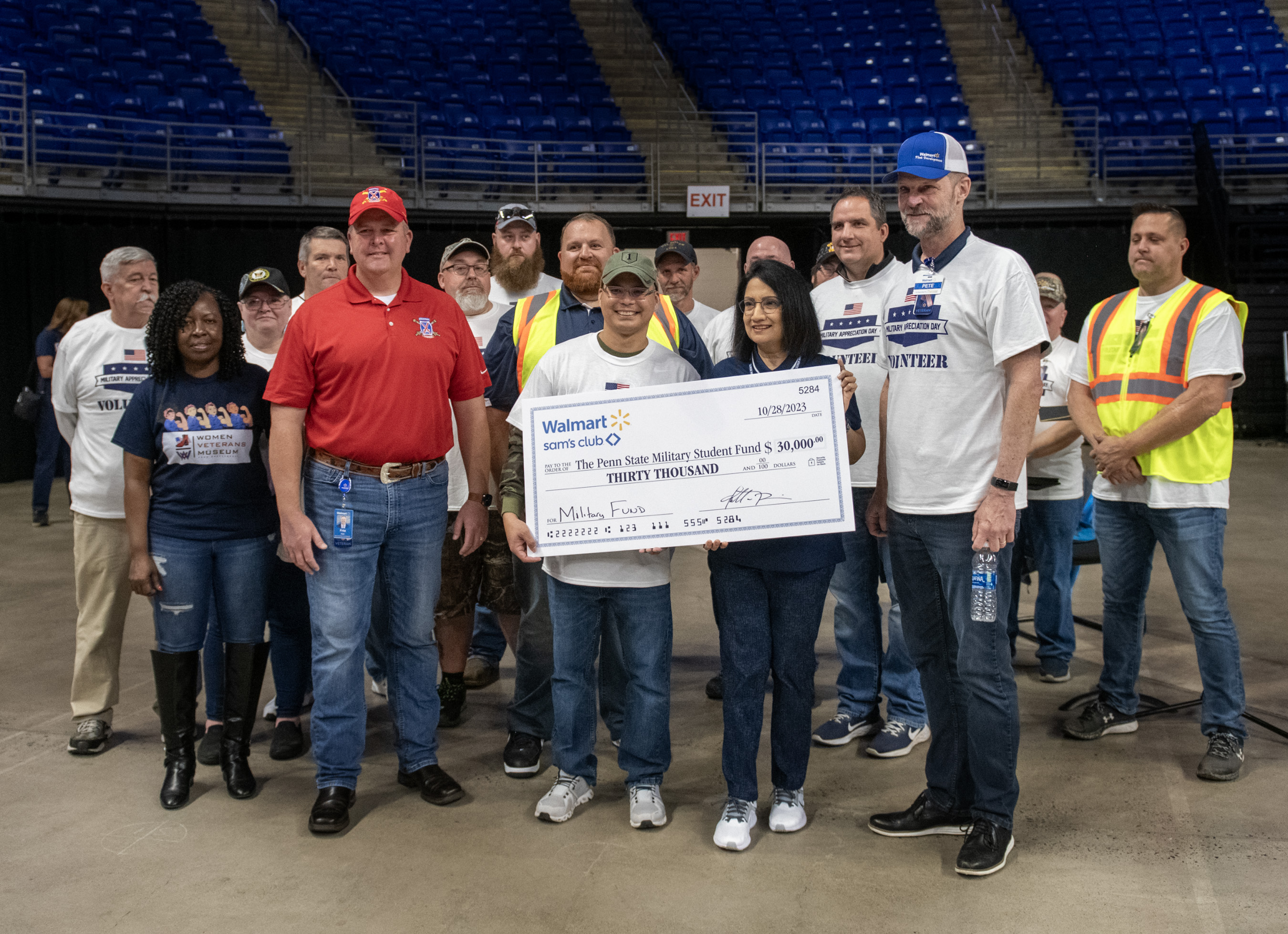 Dr. Bendapudi receives donation from Walmart