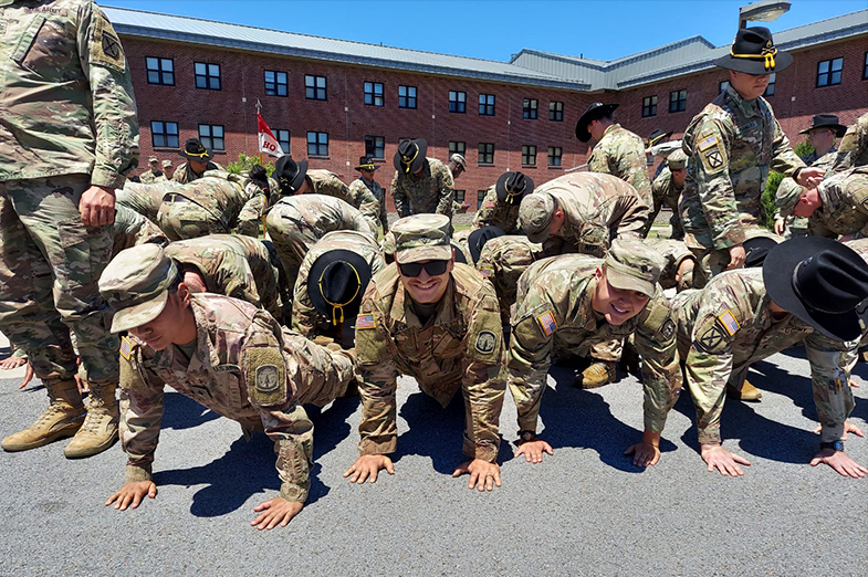 A group of Amr soldiers does push ups. 