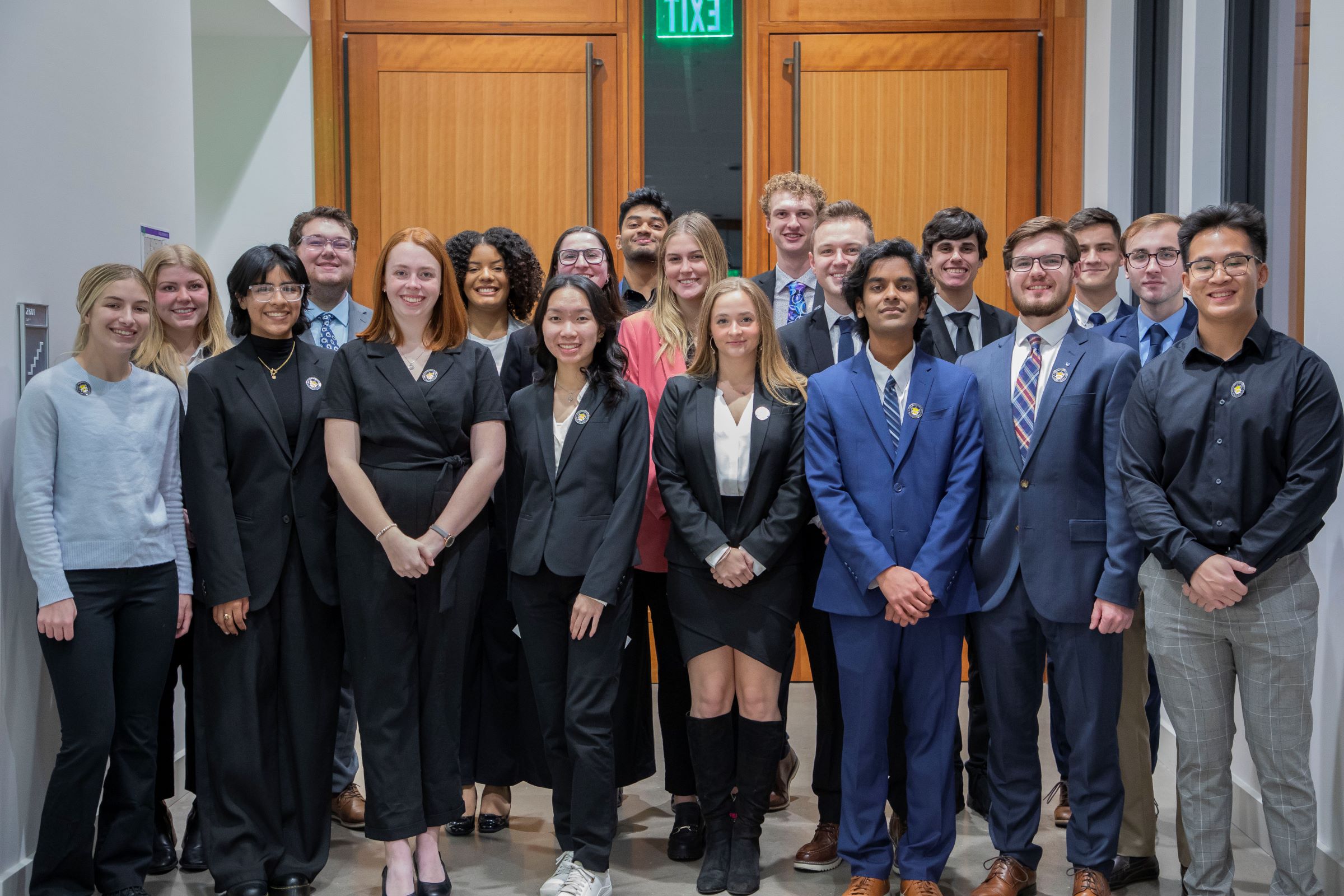 group of 19 college students in business attire