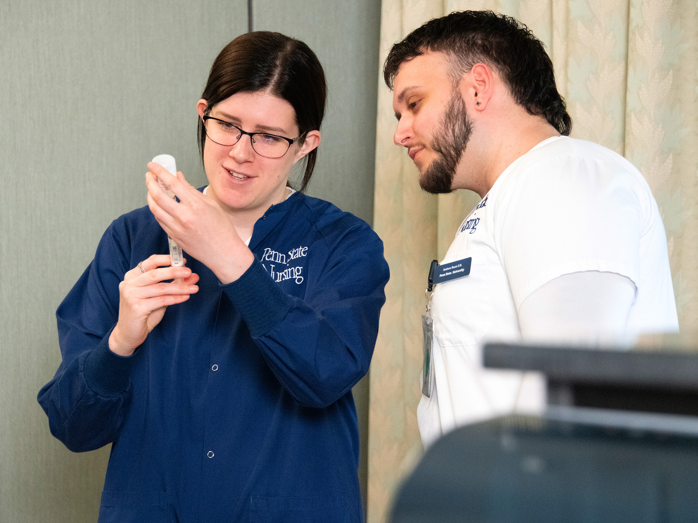 Two nursing students on campus.