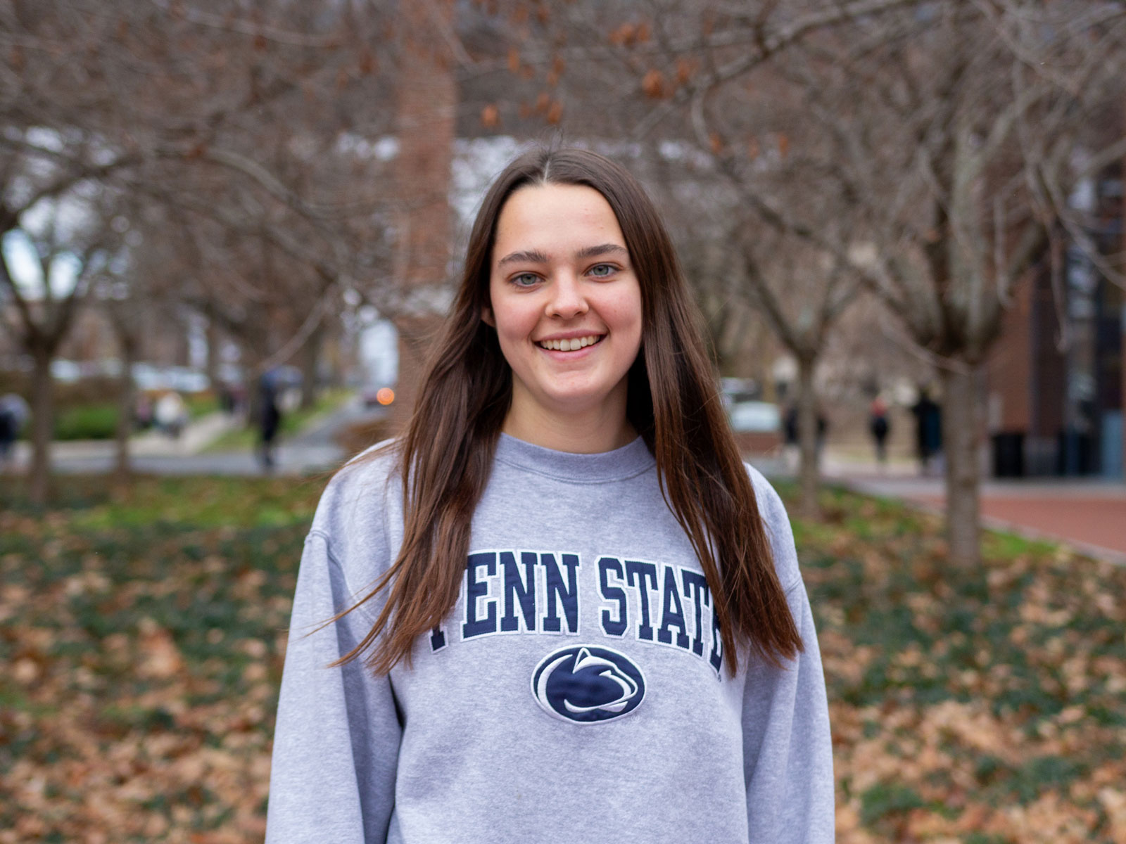 Brooke Sargen in front of trees on campus