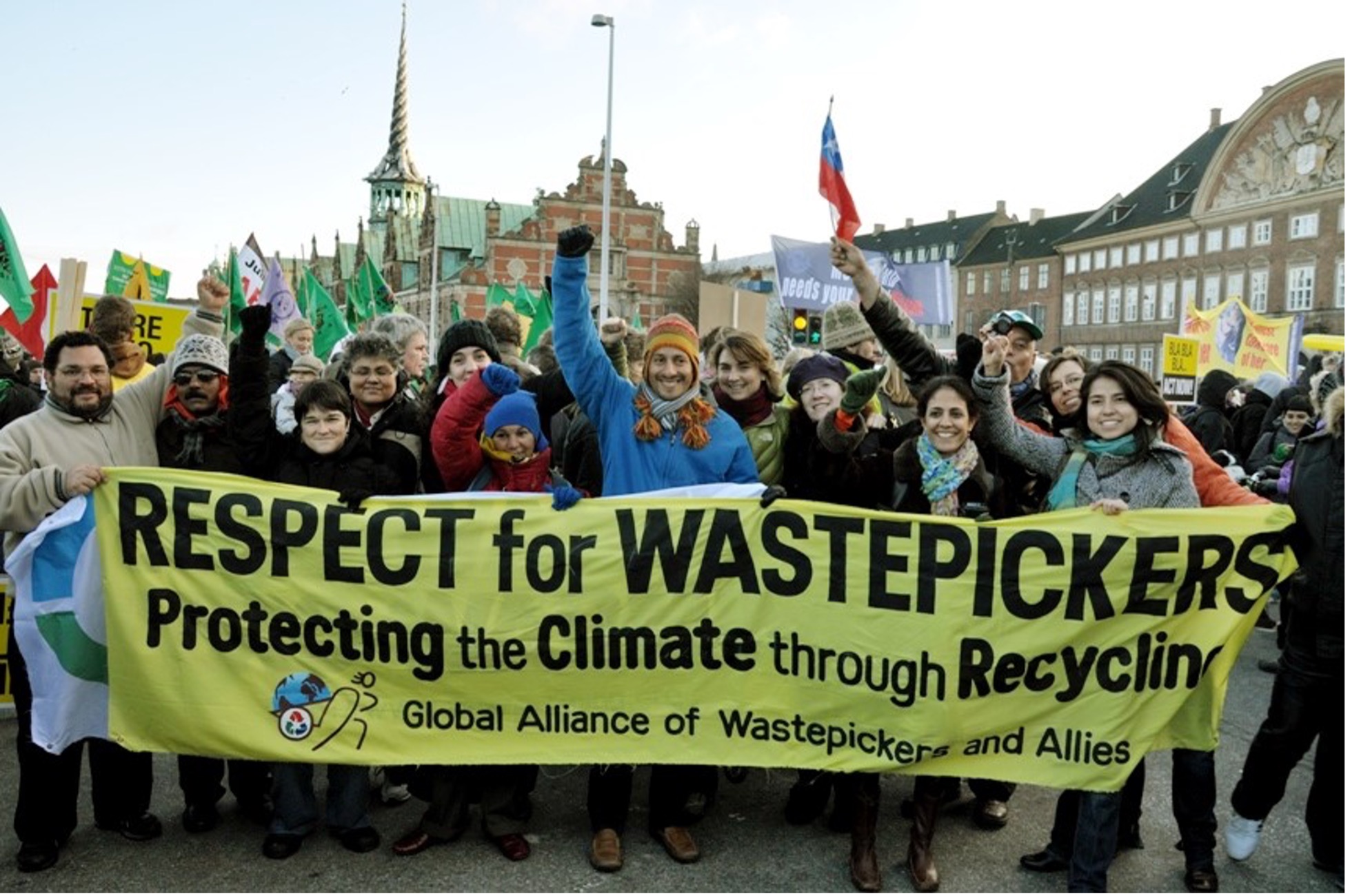 A protest by waste pickers at a conference in Copenhagen, Denmark, highlights the movement by waste workers globally to organize for rights that will be discussed at a January 31st talk.