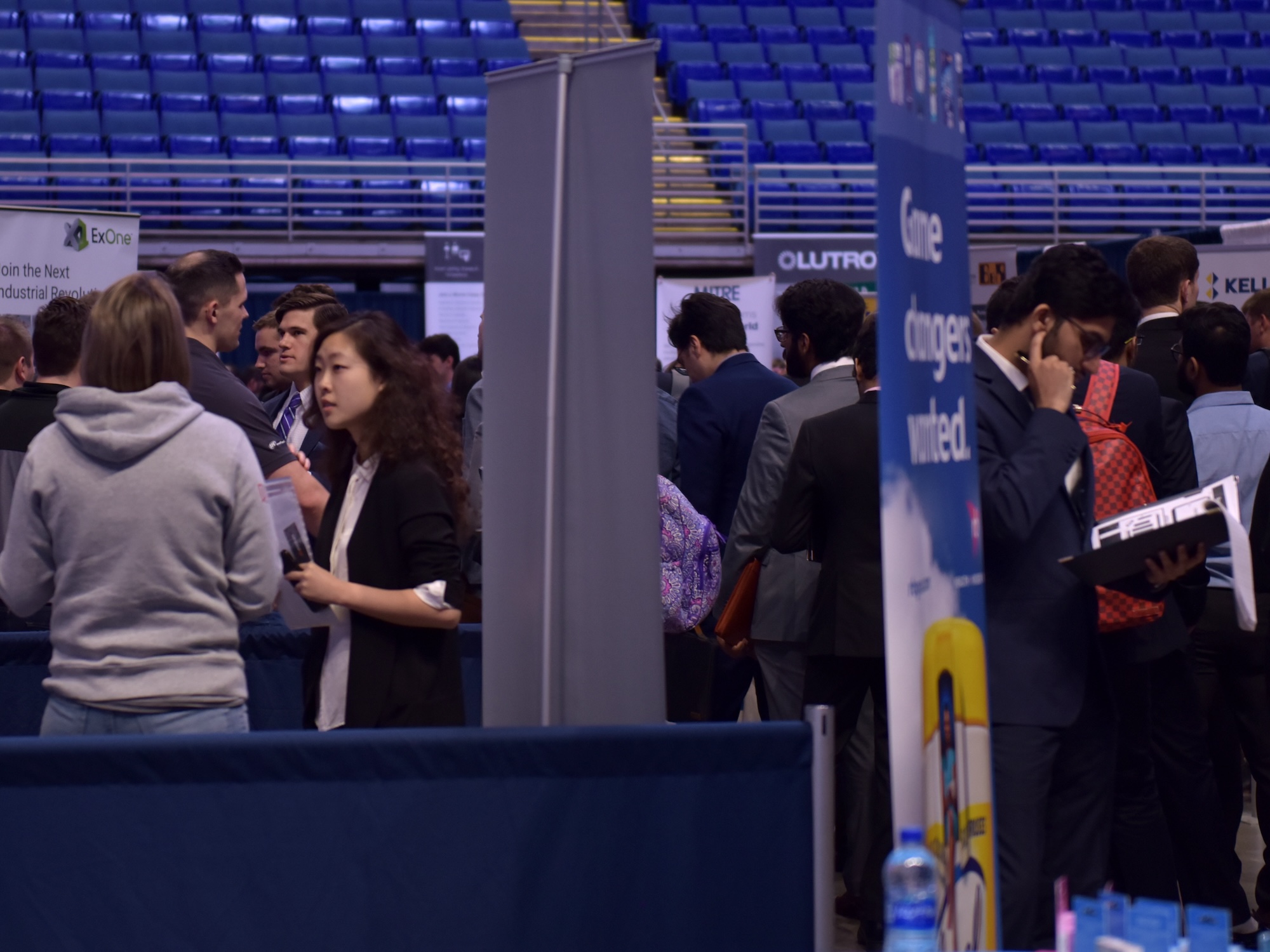 Students at Spring Career Days talk to employers and review materials