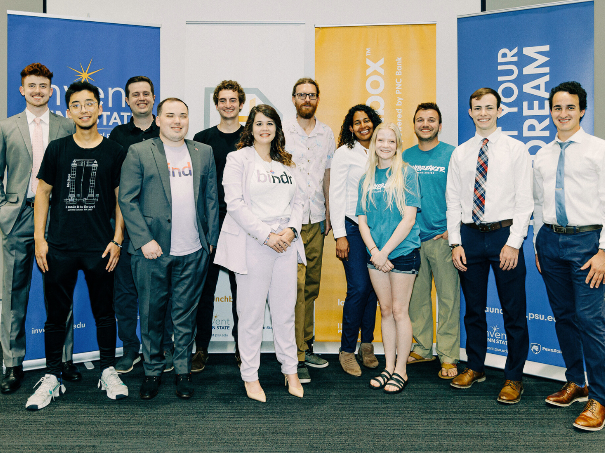 Student Summer Founders Program teams pose in front of Happy Valley LaunchBox powered by PNC Bank signage