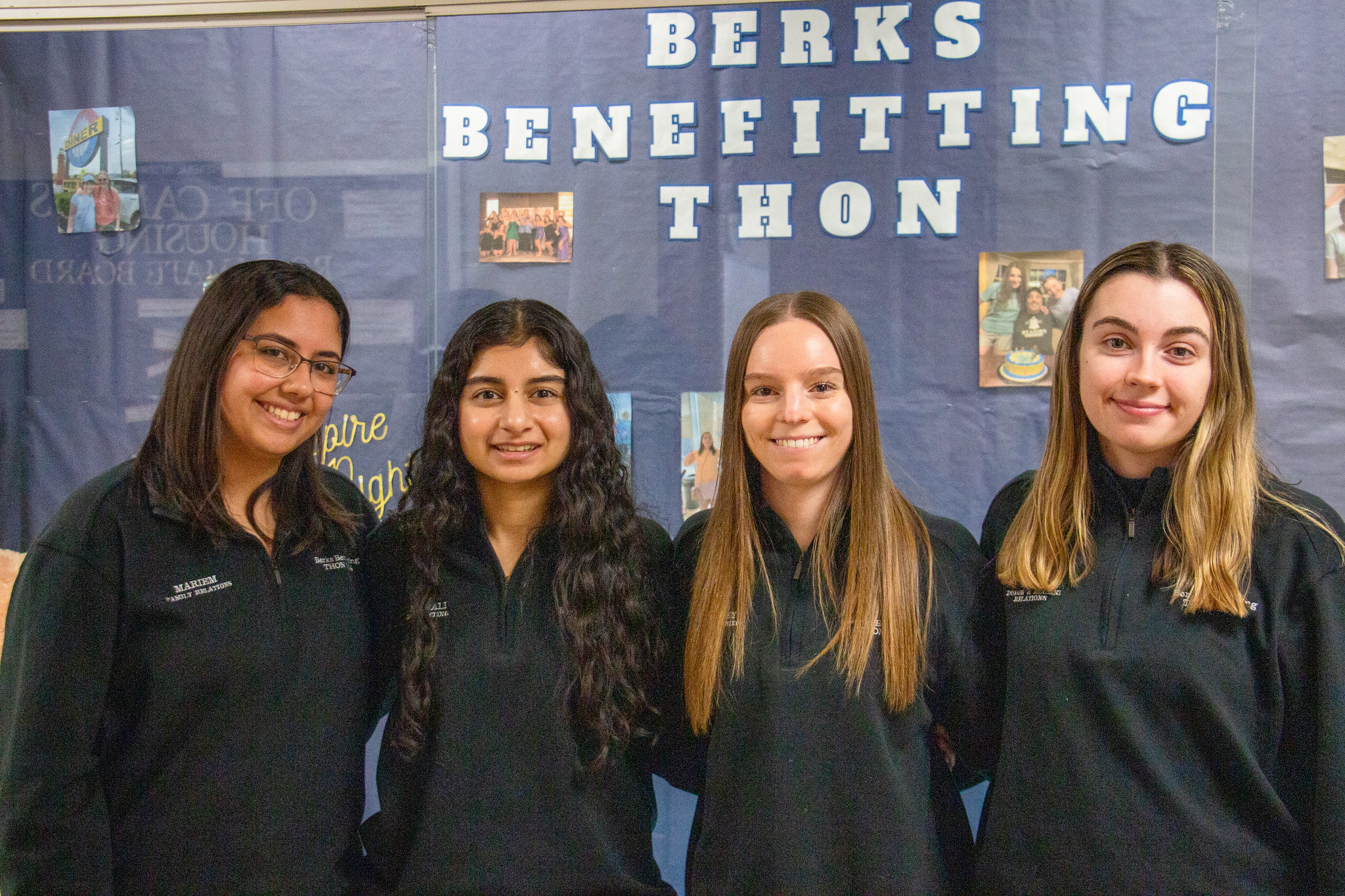 Four female Berks students smile for the camera