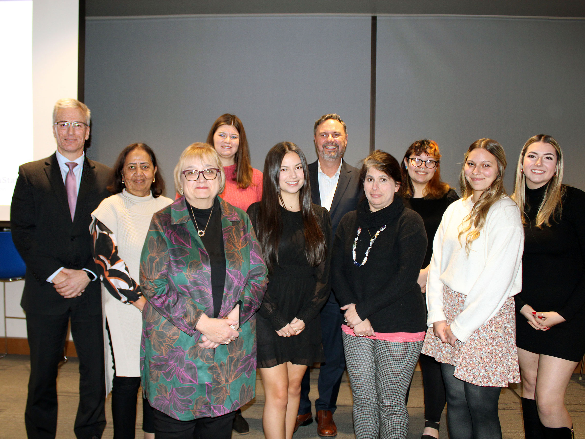 newly inducted KON members and HDFS faculty pose for a group photo at the induction ceremony