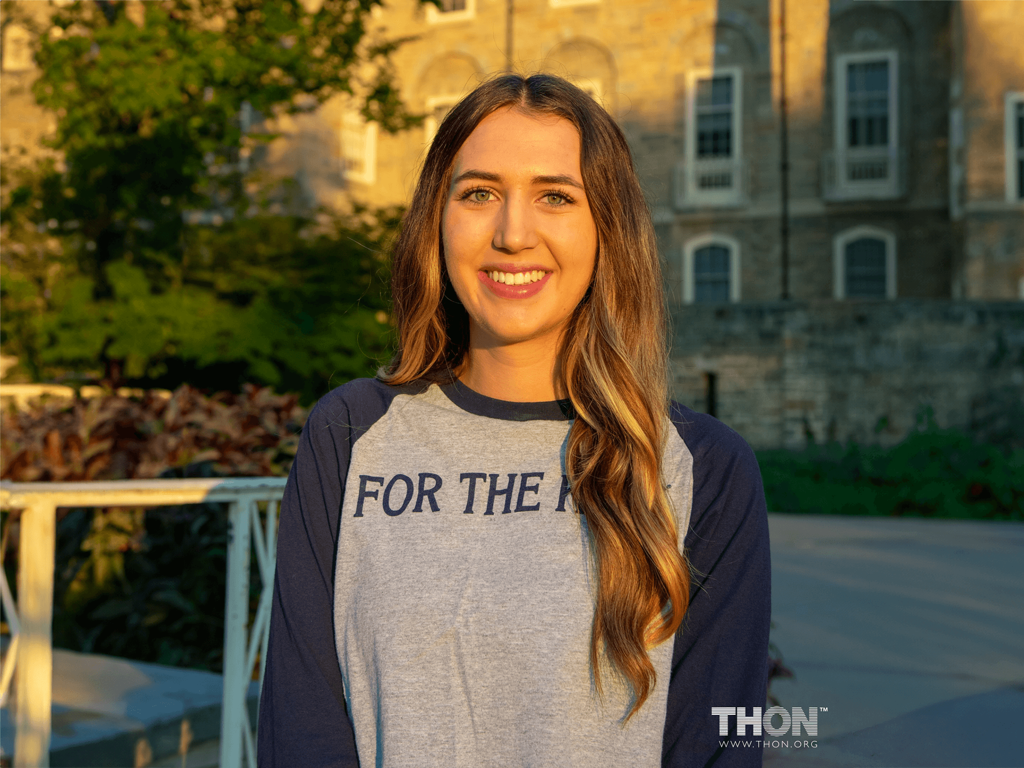 Julia Jakuboski stands in front of Old Main at Penn State University Park.