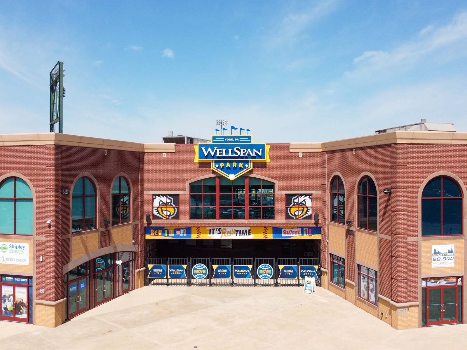 Brick front gates of a baseball park and sign WellSpan Park 