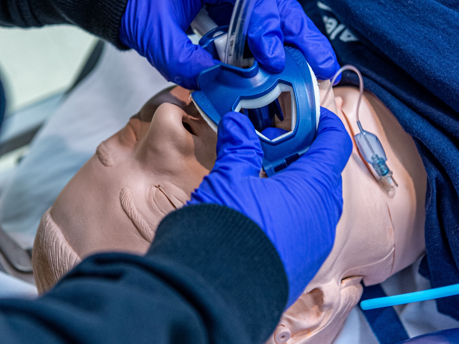 EMT students train on a patient simulator