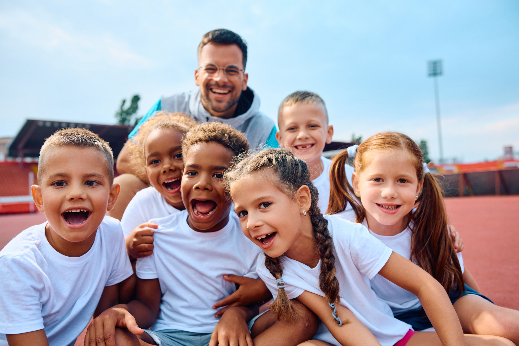 Young children together at a sports practice