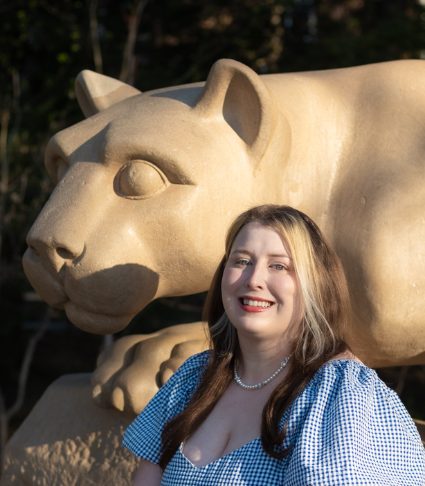 Portrait of Heather Novak in front of the Lion Shrine