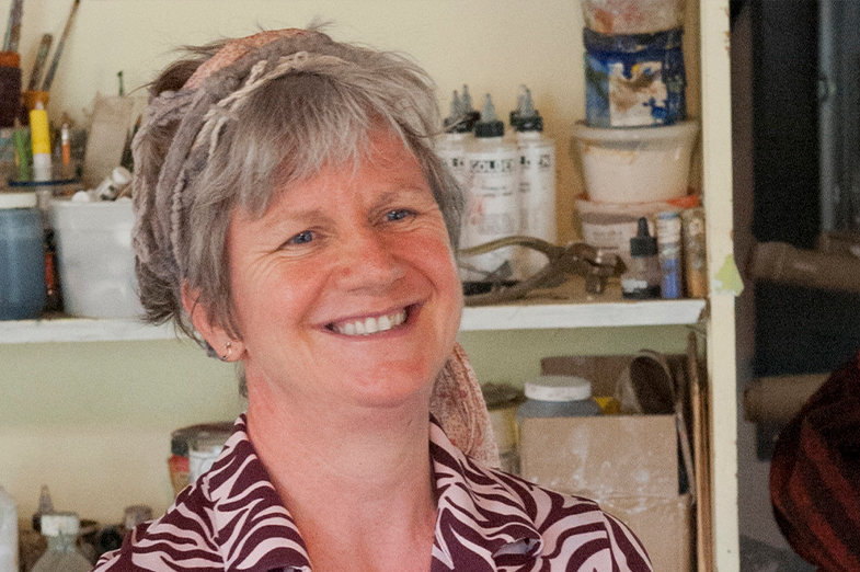 Woman with grey hair smiling