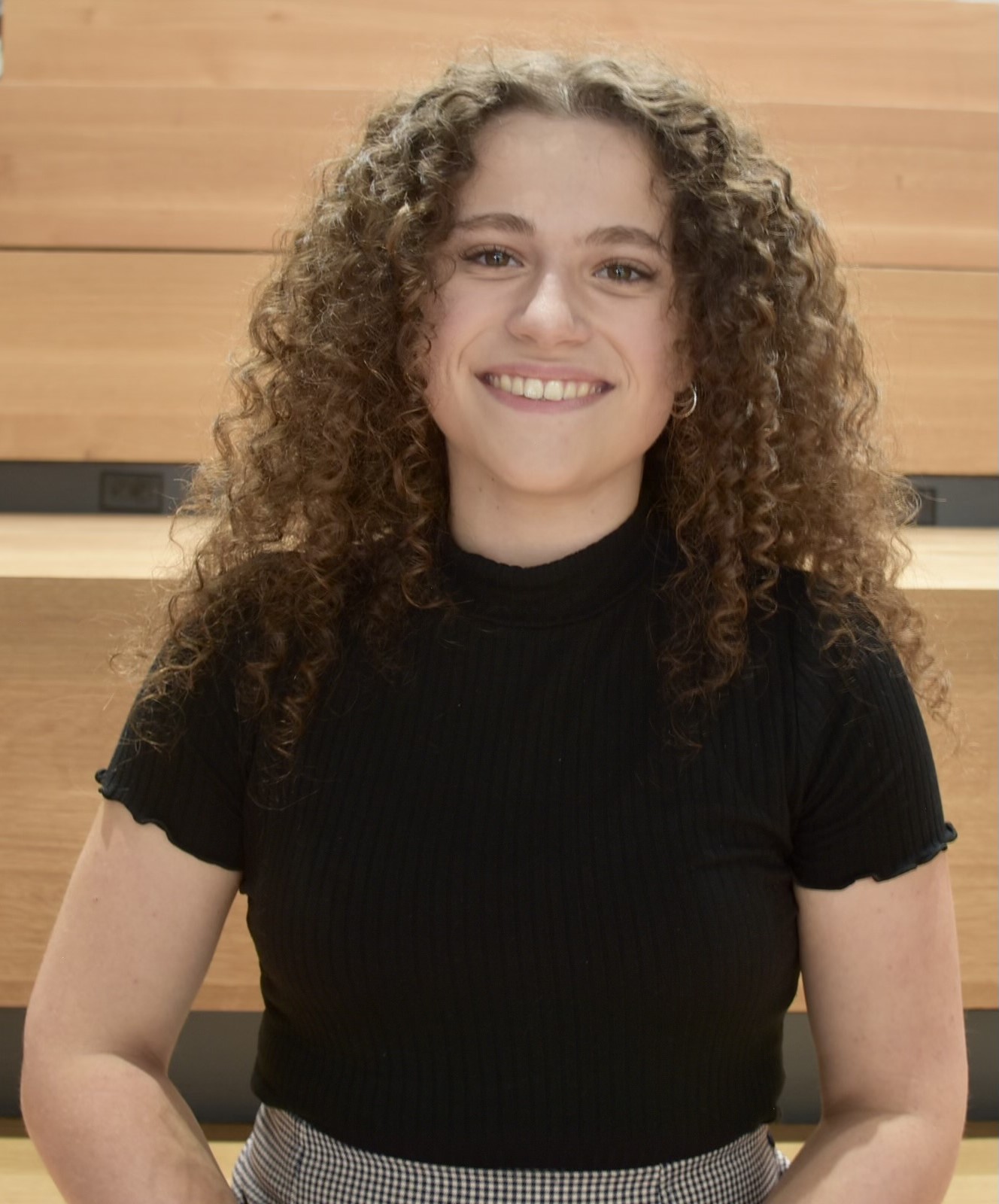 A person sitting in an auditorium