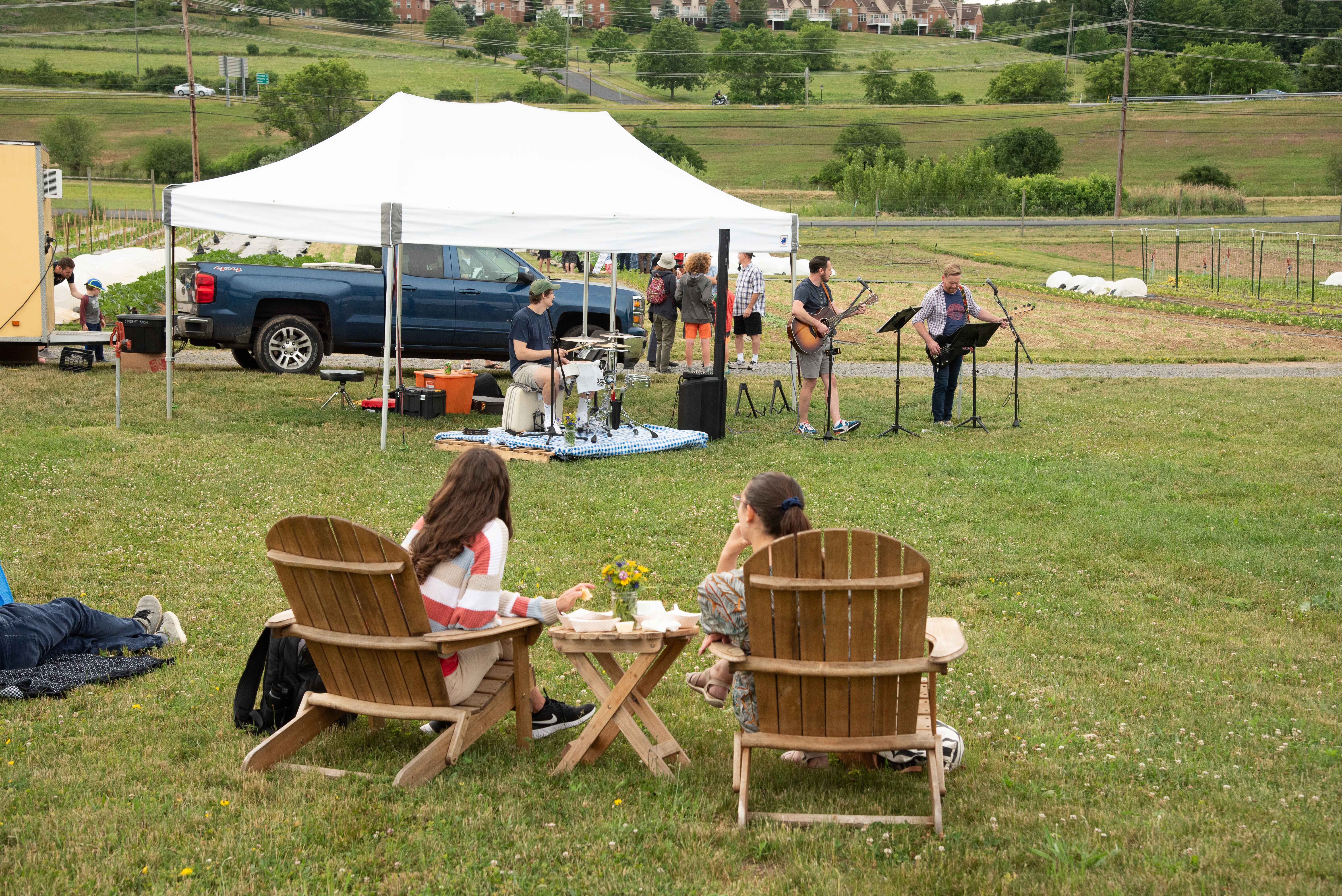 Students sitting at Student Farm event 