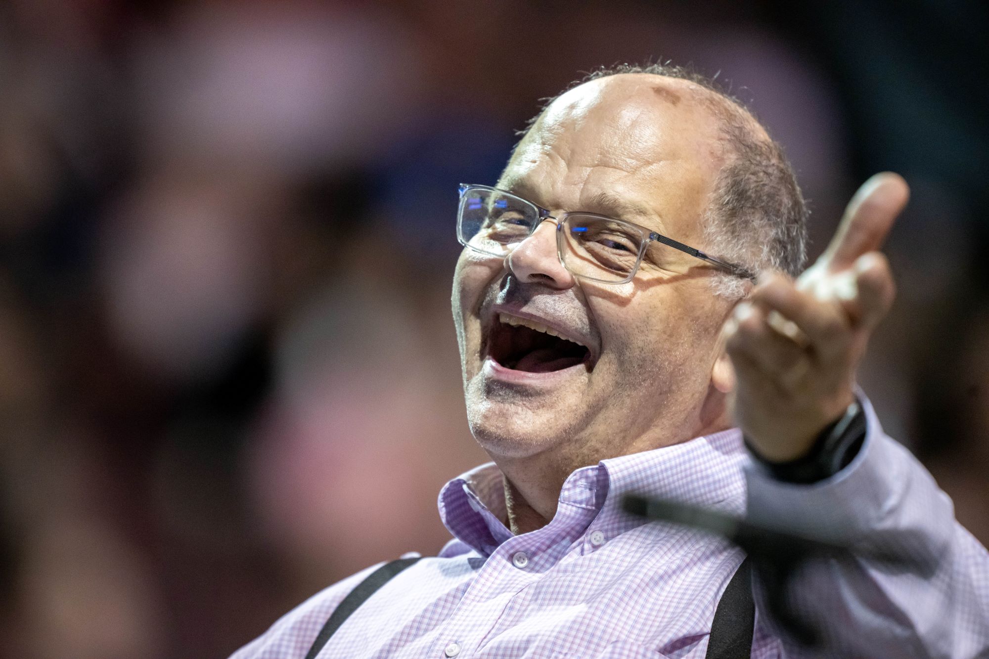 Gary Viebranz, teaching professor of music at Penn State Behrend, smiles while conducting the commencement band.