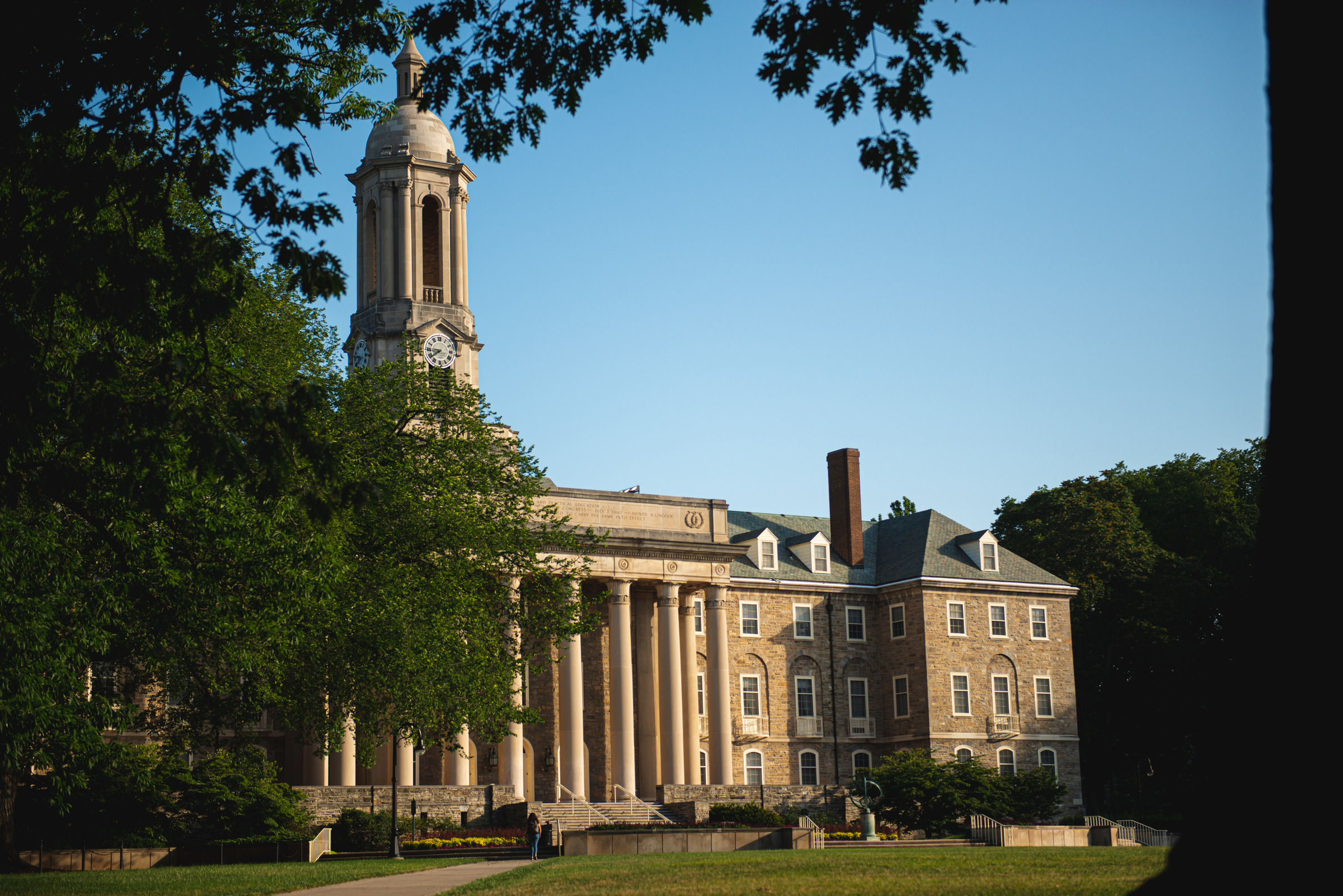 Old Main building and trees in summer