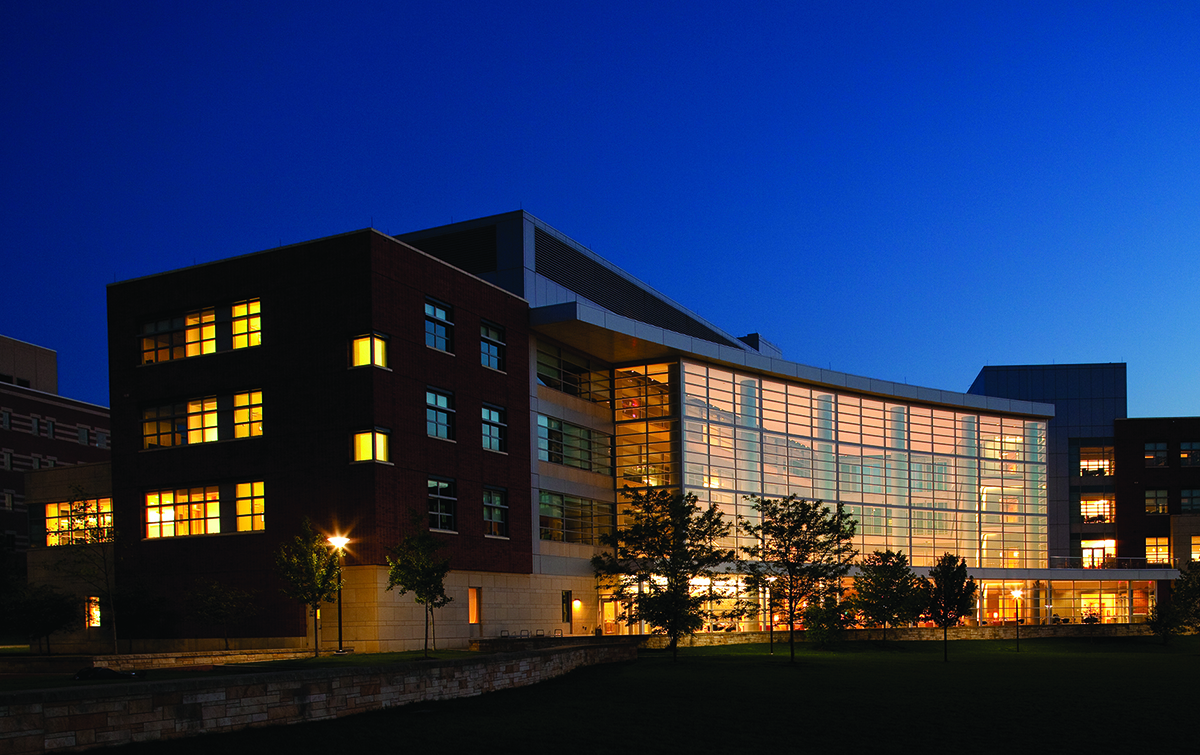 A night-time picture of the Business Building at Penn State.