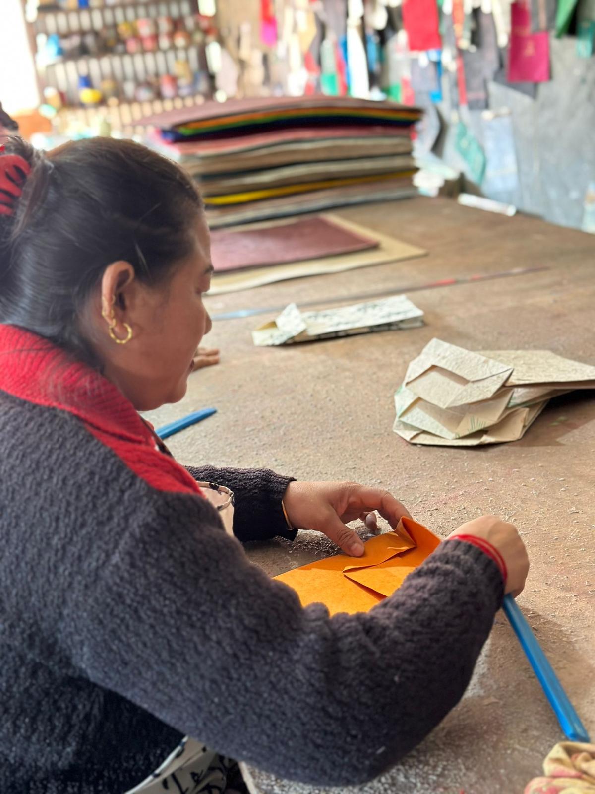 Woman making paper