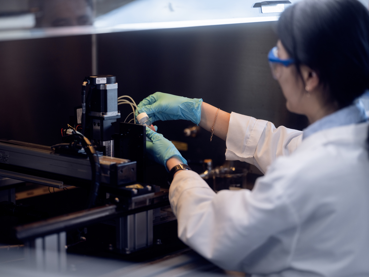 Researcher working in a lab setting