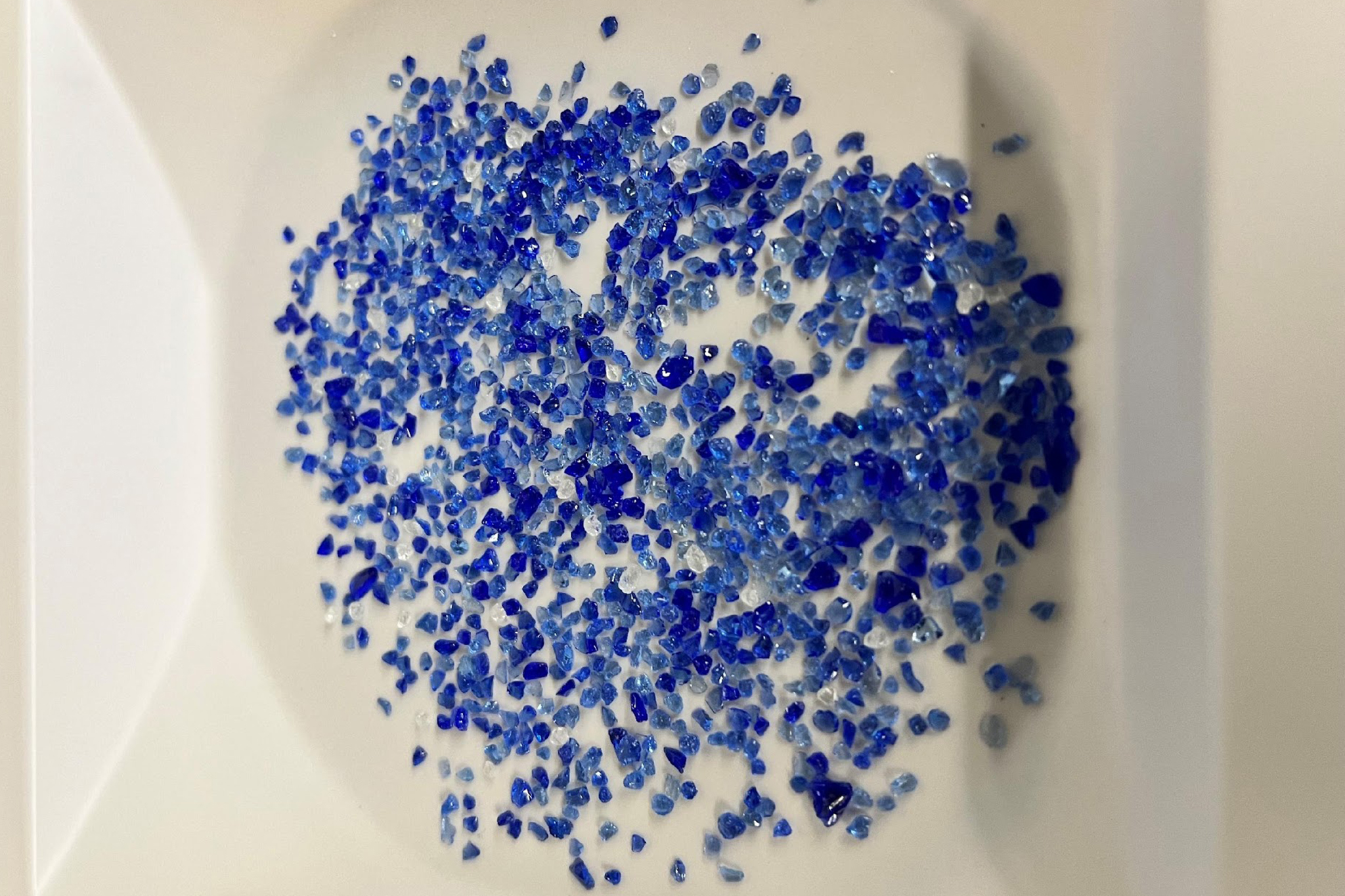 Small pieces of crushed blue bottle glass 