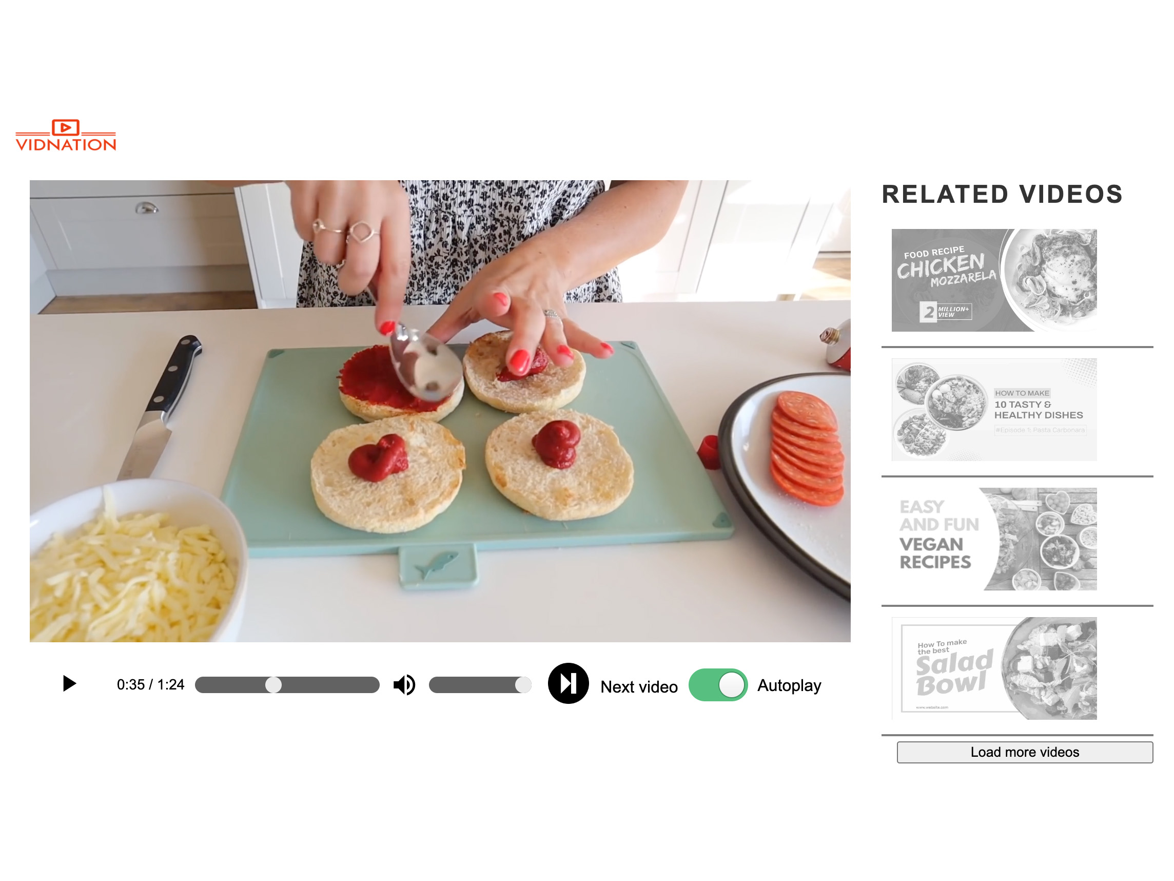 Screengrab of video platform showing hands spreading sauce on bread