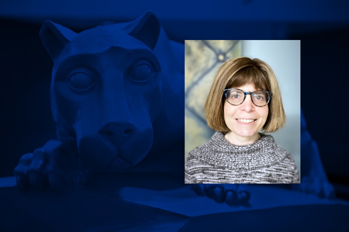 A headshot of a person wearing glasses is overlaid on a blue graphic with a statue of a lion mascot