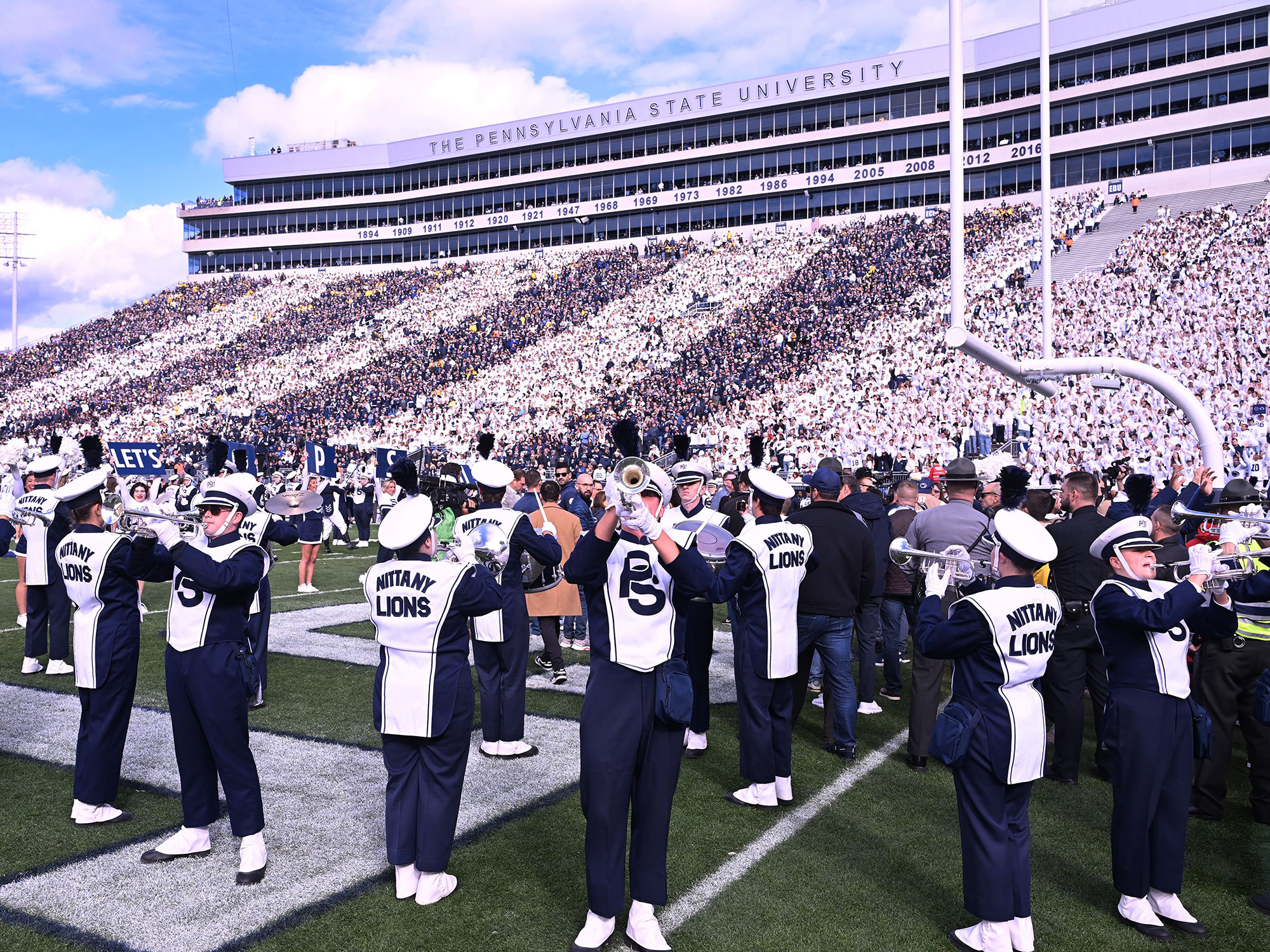 Blue Band playing on Beaver Stadium field before kickff