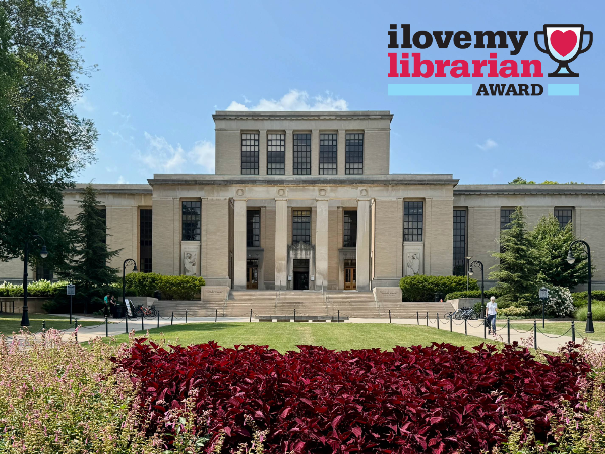 sunny photo of tall wide building with large columns, I Love My Librarian Award text graphic at top right, plants at bottom