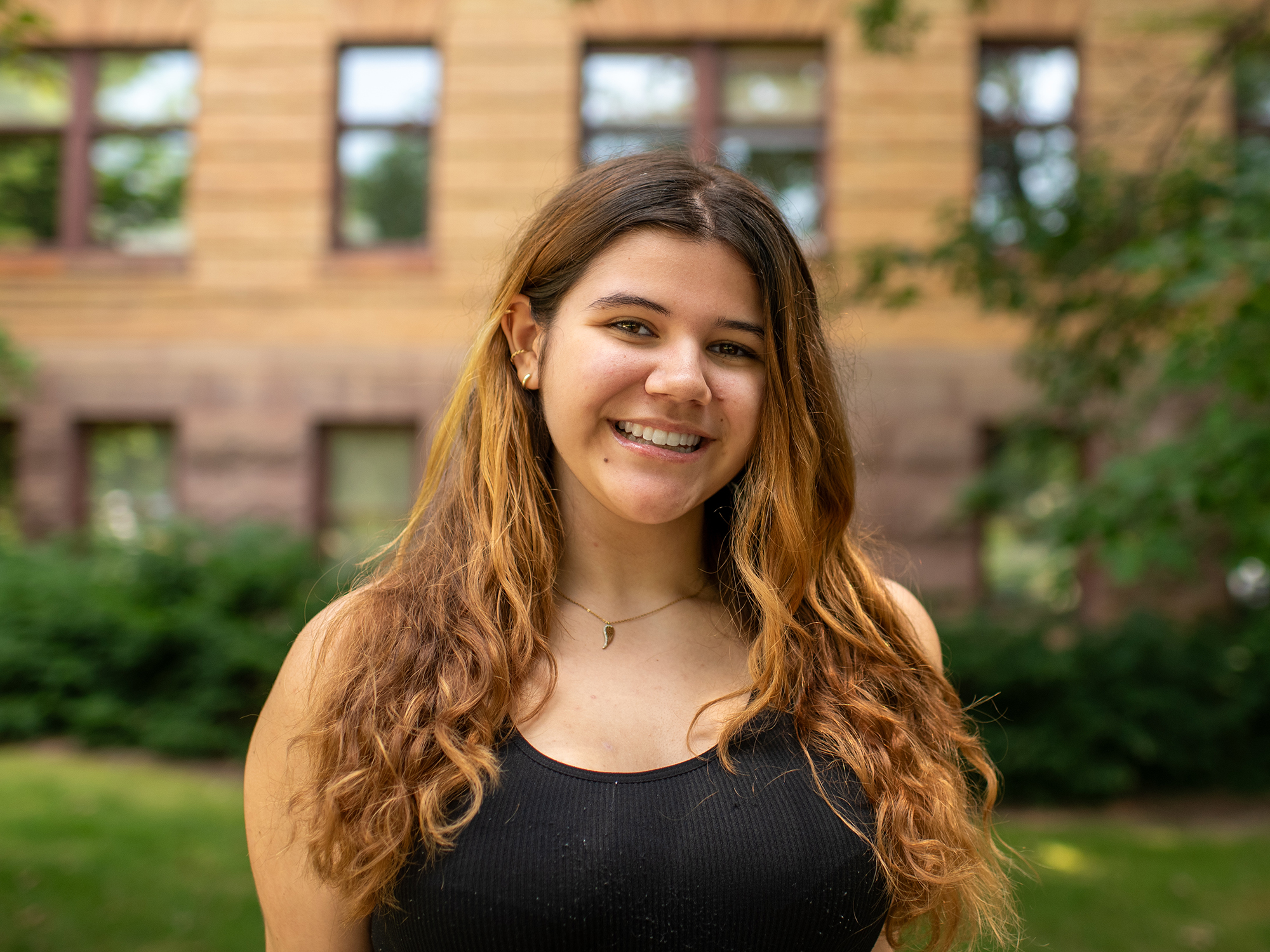 Monica Pineiro stands outside Weaver Building at Penn State University Park.