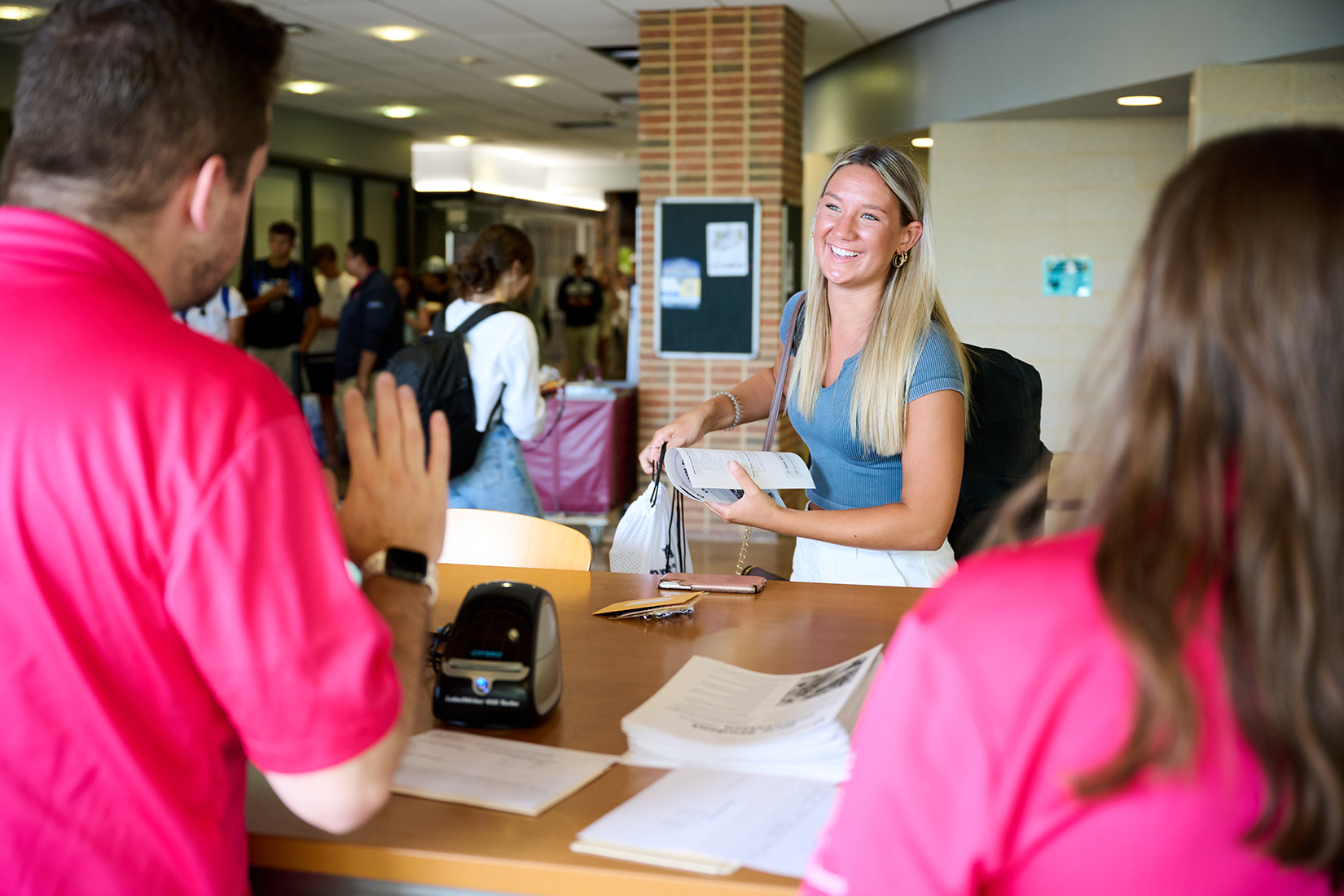 New Student Orientation leaders welcome a first-year student to orientation events.