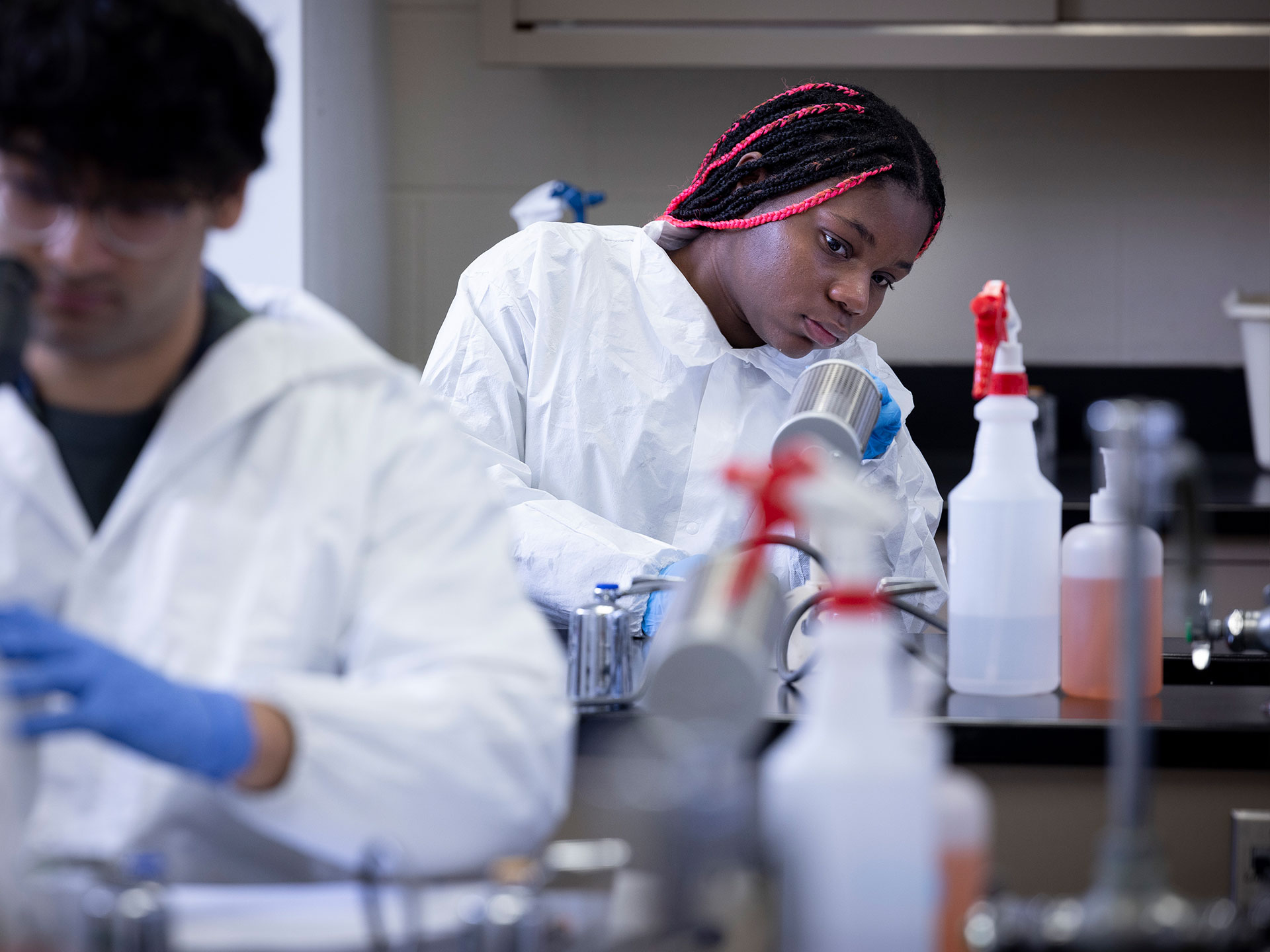 Student in a college laboratory