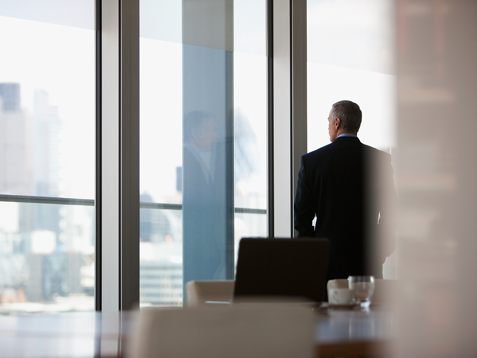 Person looking out window