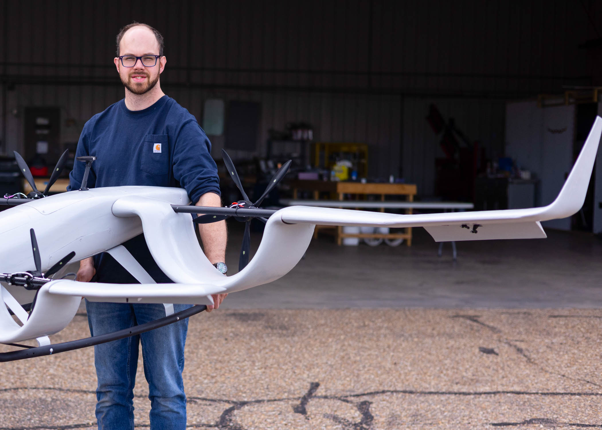 Clark Fuller holds a prototype drone