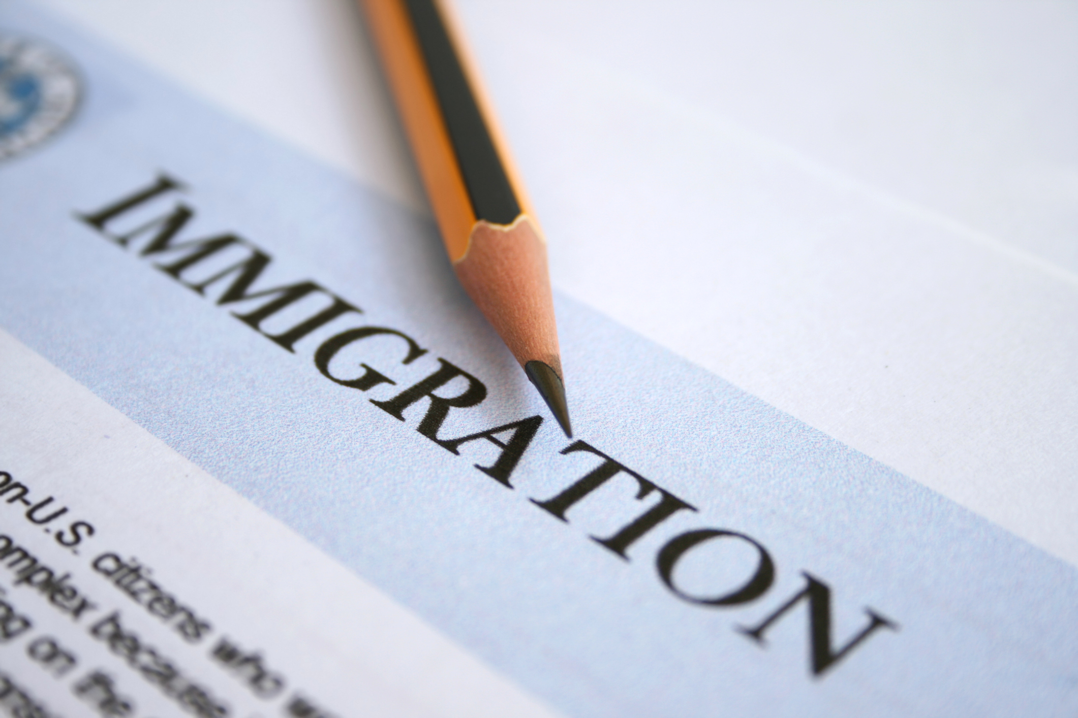 Close-up of an immigration form and a sharpened #2 pencil