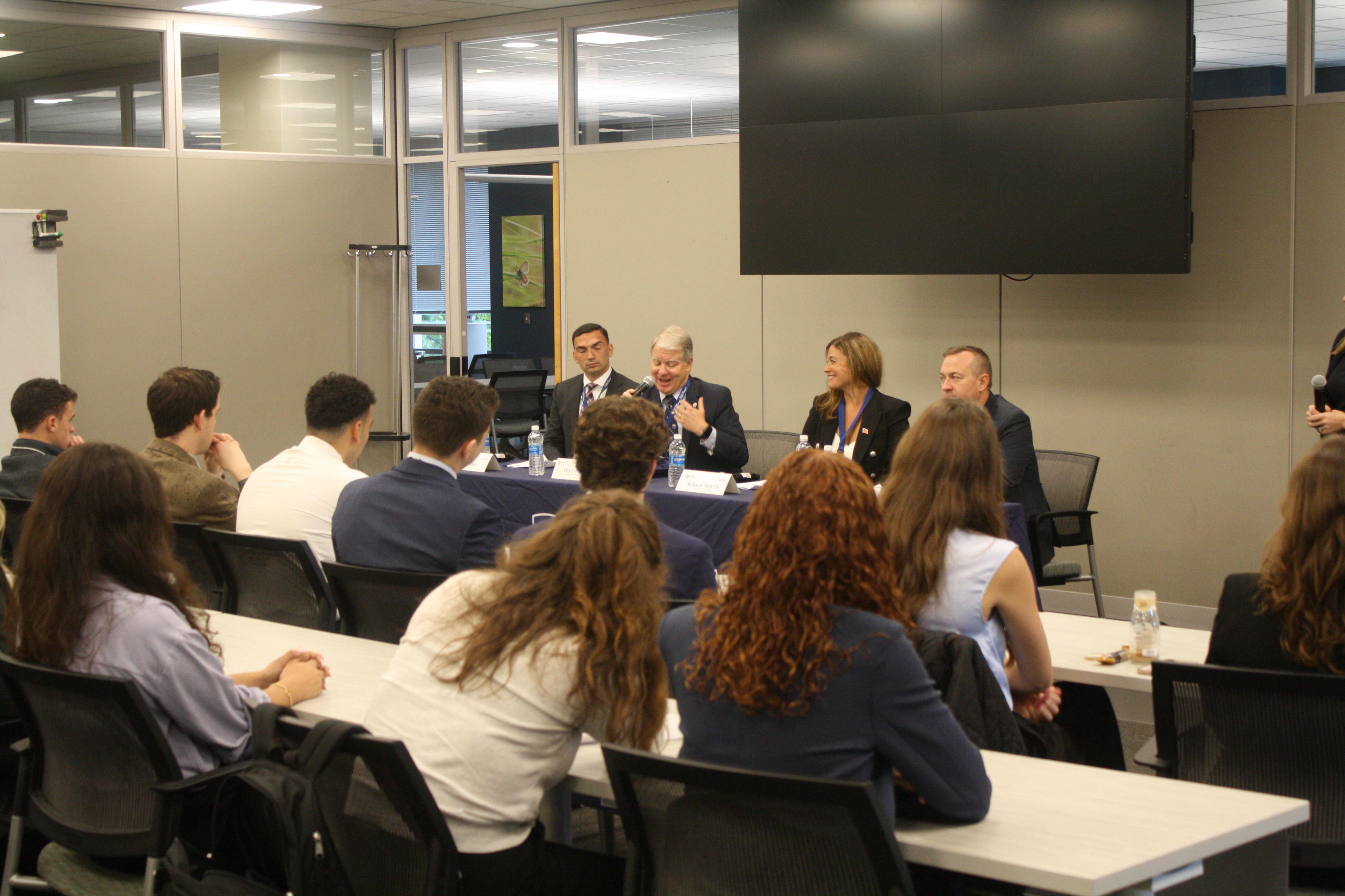 panel of Pennsylvania legislators talking to a group of students in an classroom setting