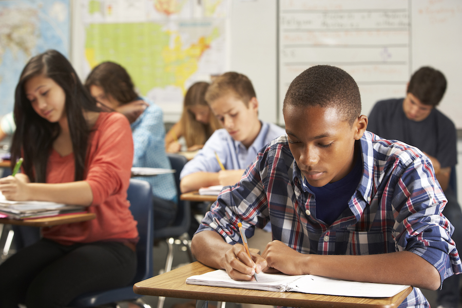 Students at desks in a classroom