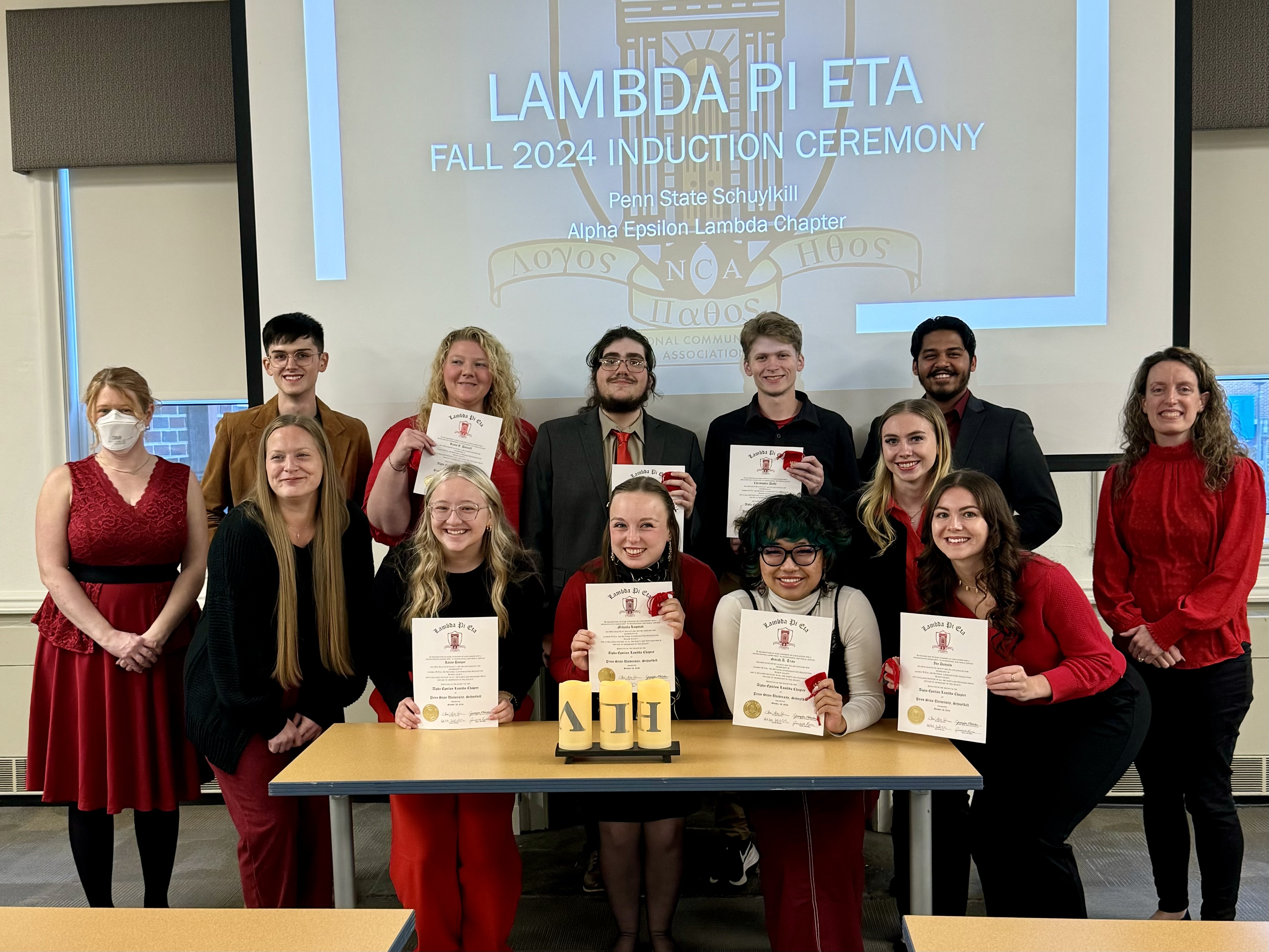 Eight new members inducted into Lambda Pi Eta