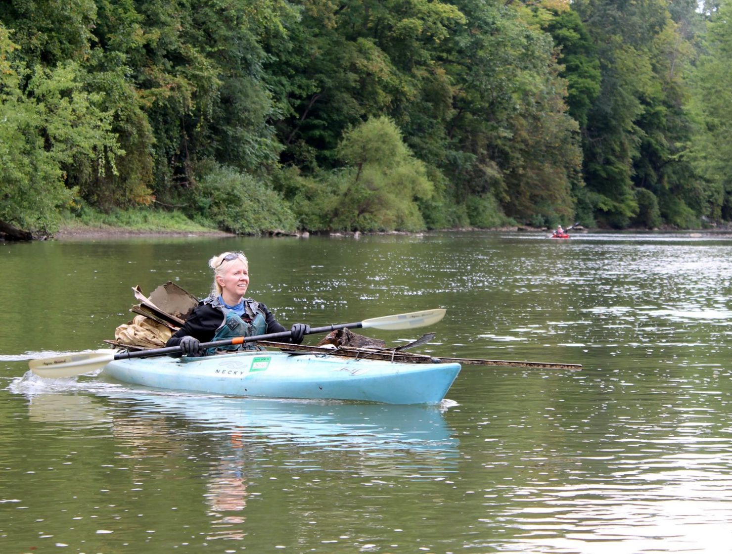 Master Watershed Steward Sue Nielsen in kayak