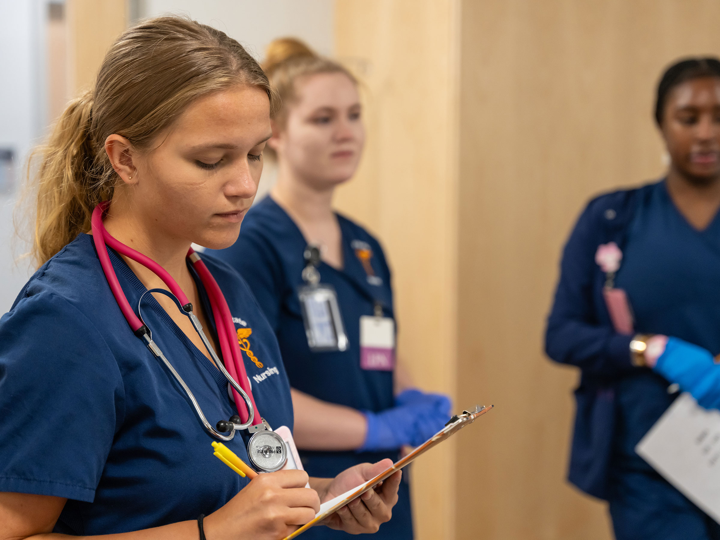 Nursing students in patient simulator lab