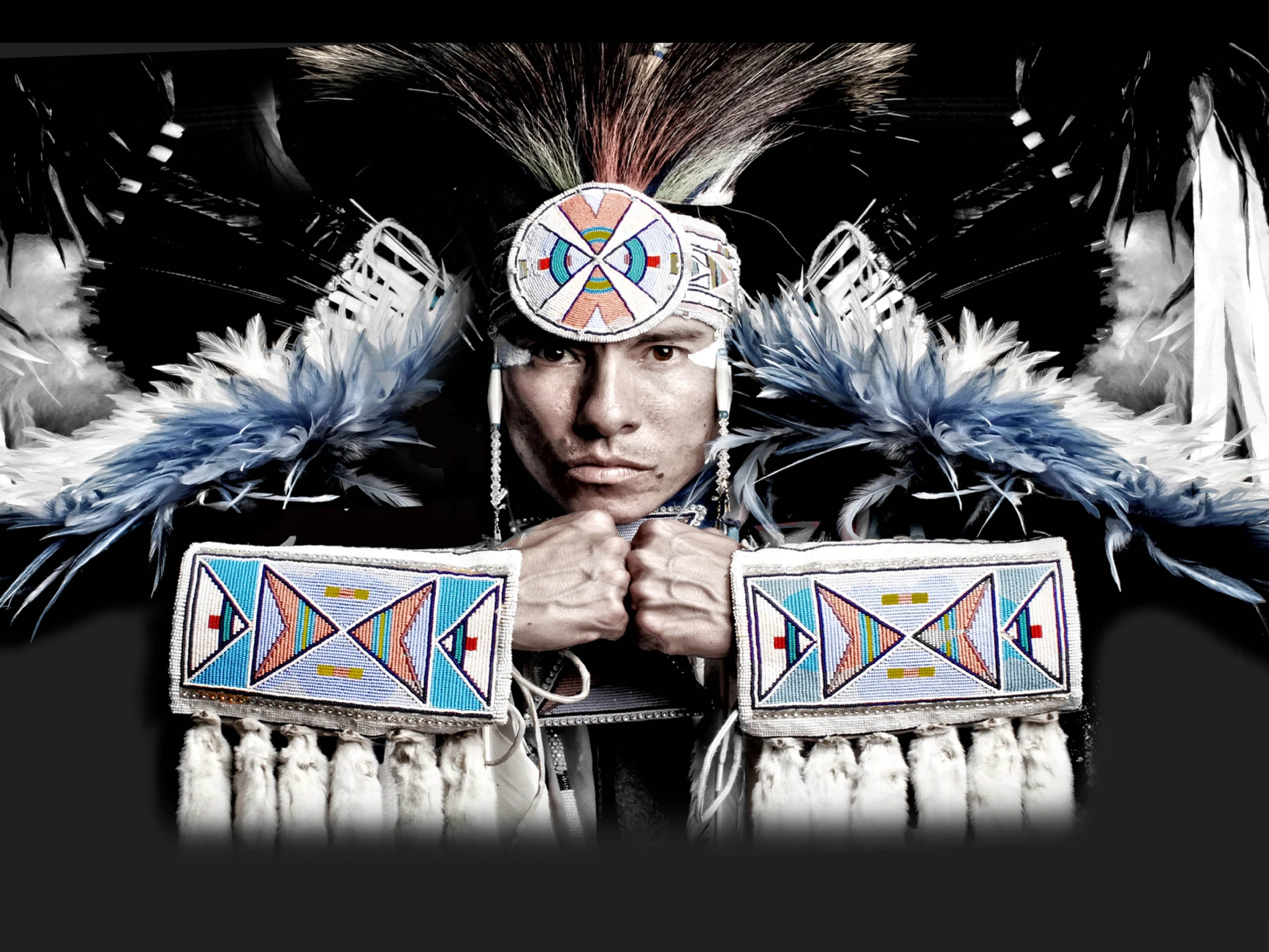  Supaman, a hip-hop artist and Native American dancer, is pictured in Indigenous clothing