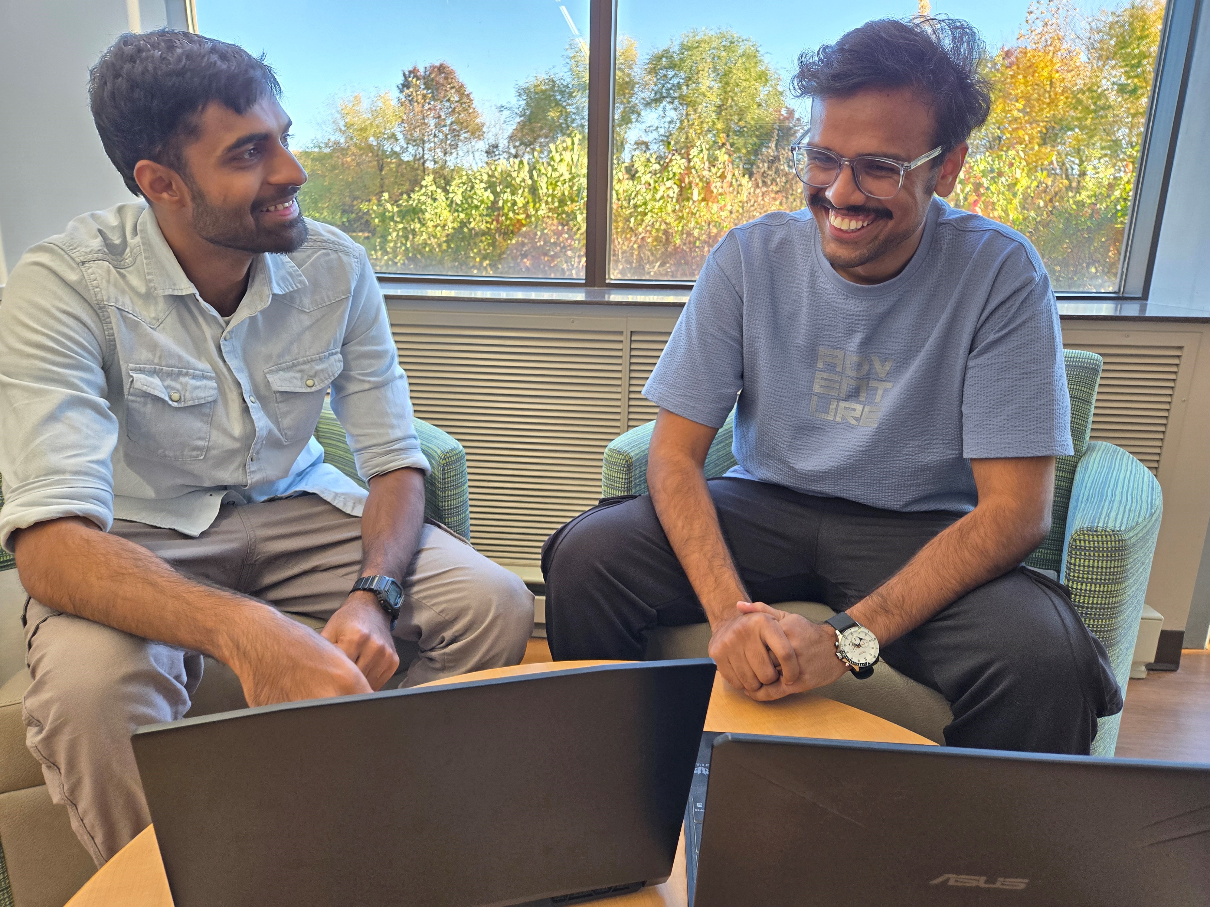 Data analytics student researchers collaborate on a project