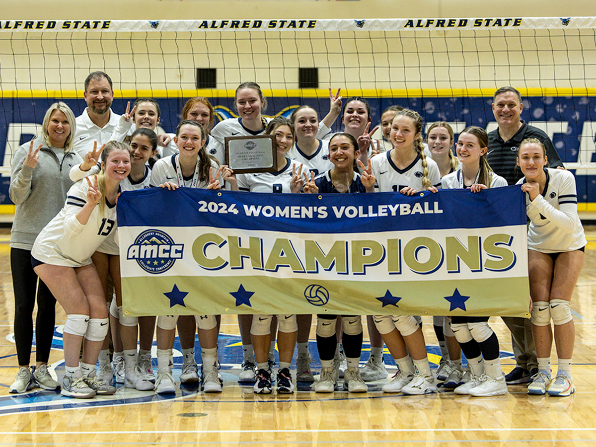 Penn State Altoona women's volleyball team poses for a photo after winning the 2024 AMCC Championship