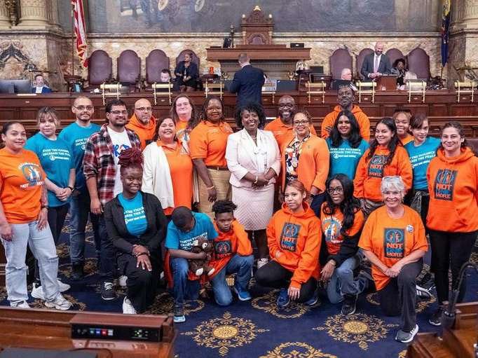 Group of students wearing "Not One More" gear in Harrisburg.