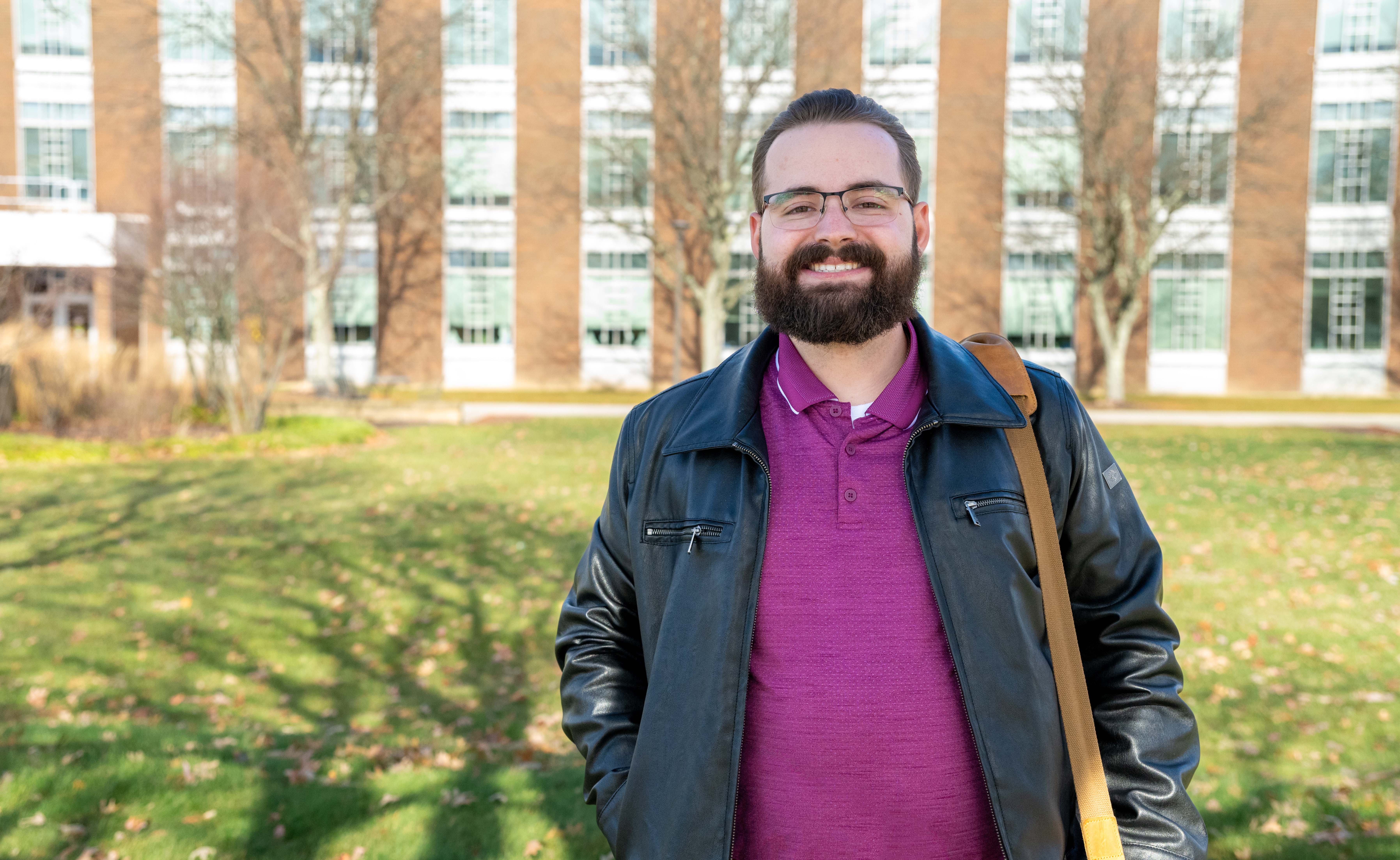 Joshua Krause standing outside Penn State Fayette.