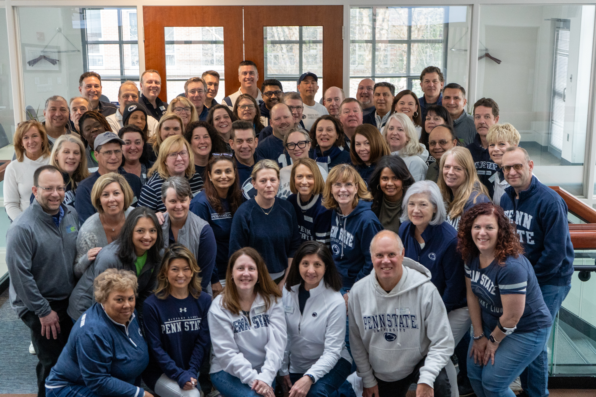 Parent volunteers with the Penn State Parents Council gather for a group photo.